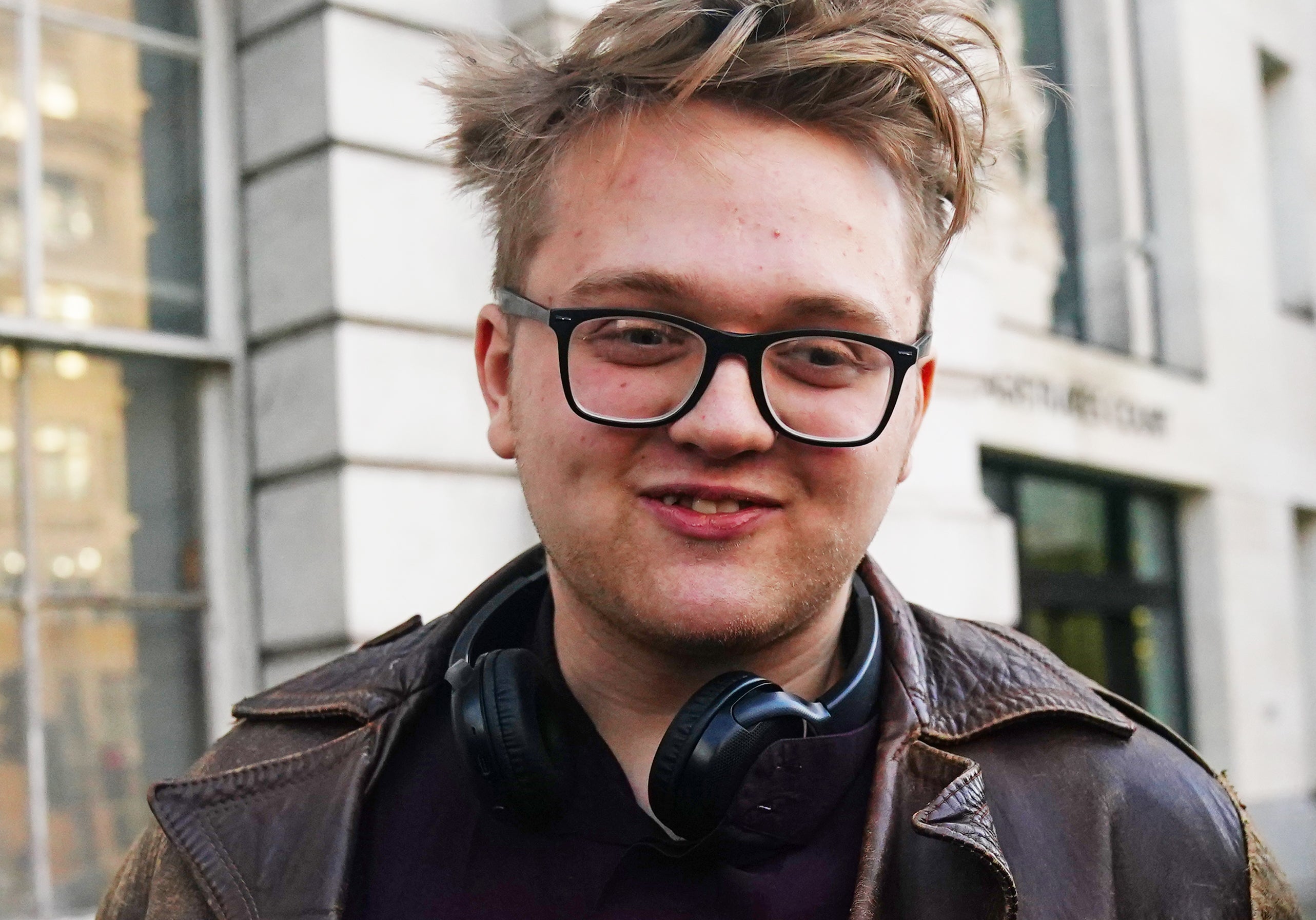 Harry May leaves Westminster Magistrates' Court in London, after pleading guilty to throwing an egg towards King Charles III