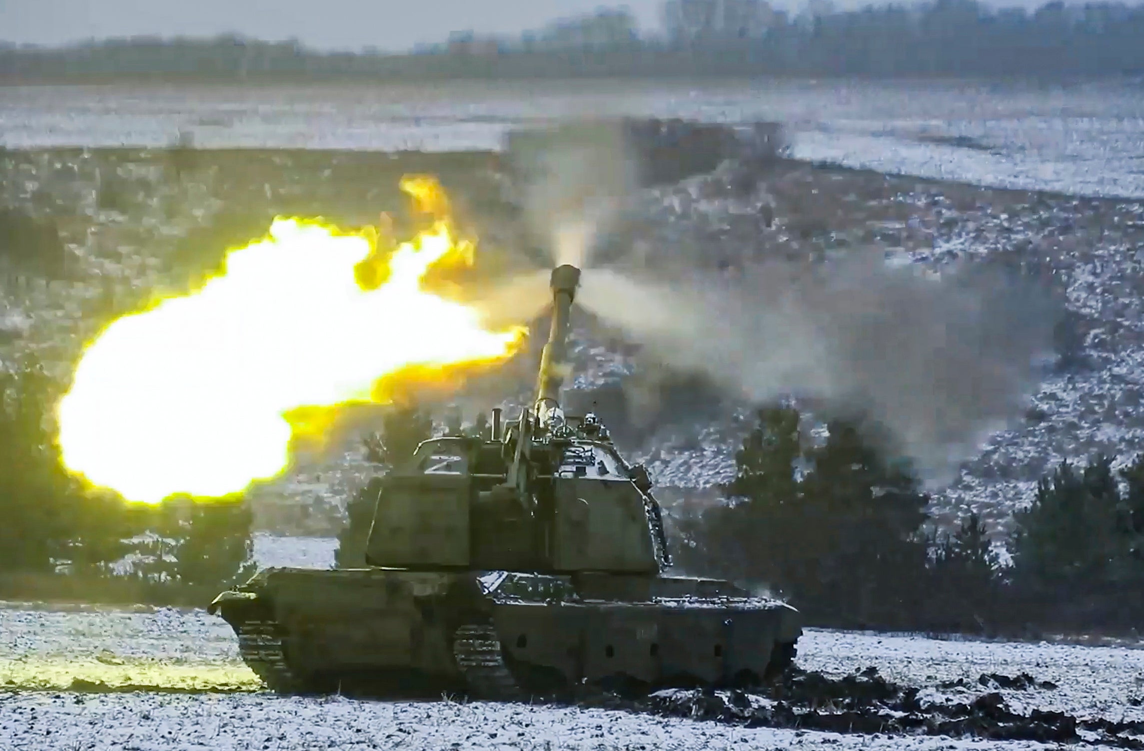 A Russian self-propelled 152.4 mm howitzer fires at an undisclosed location in Donetsk region, in an image released by the Kremlin