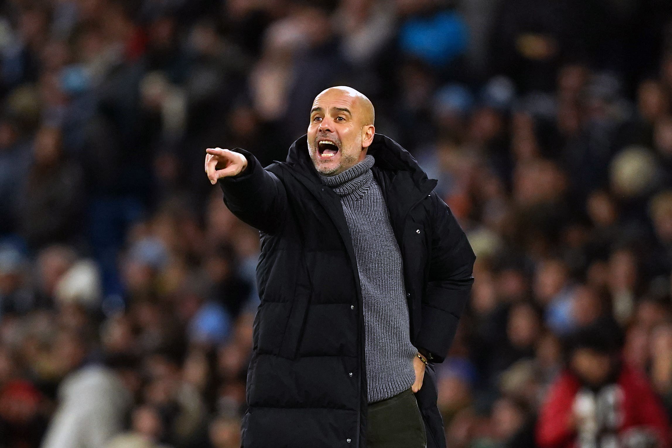 Pep Guardiola is expecting a strong challenge from Manchester United (Martin Rickett/PA)