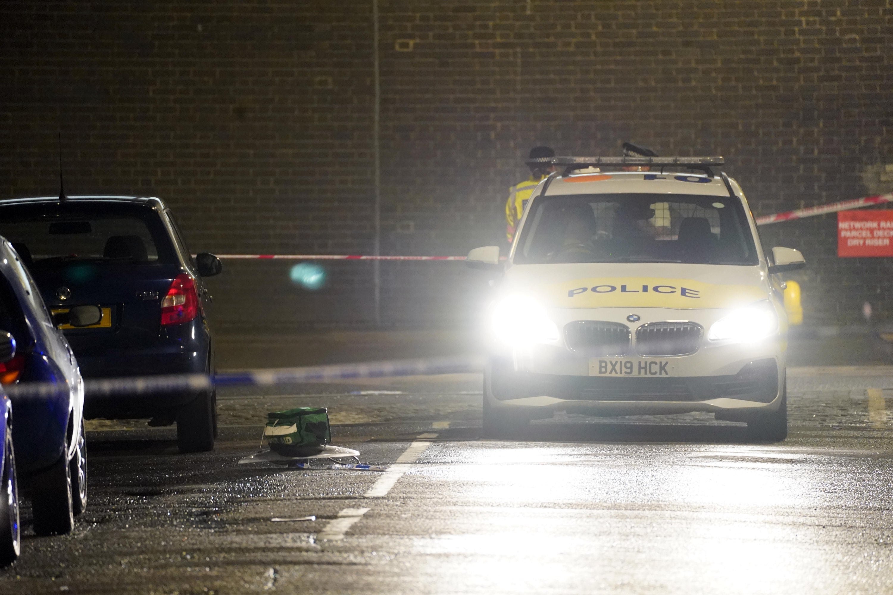 A medical bag is left in position at the scene of the suspected drive-by shooting