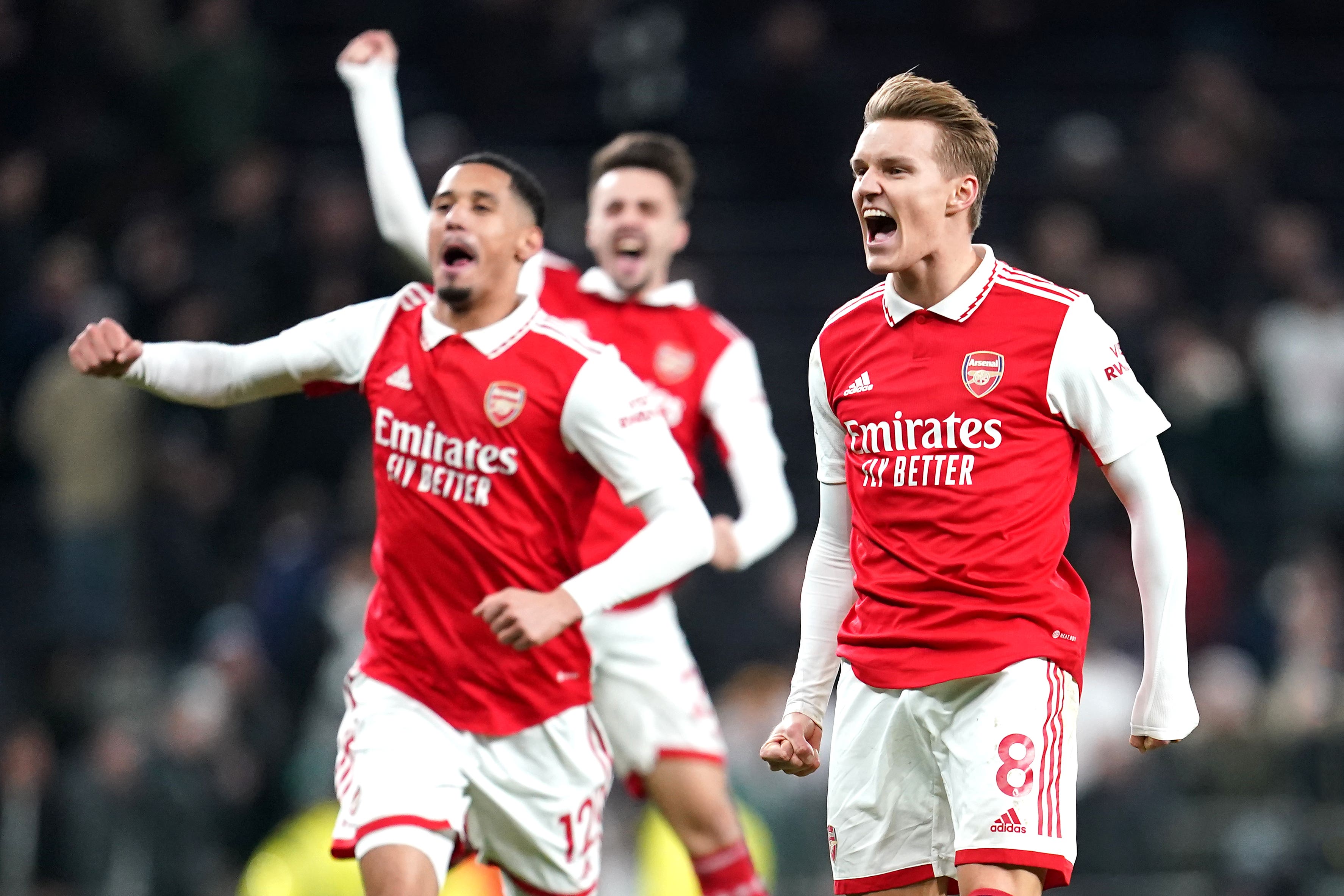 Martin Odegaard (right) celebrates in front of the away fans (Nick Potts/PA)