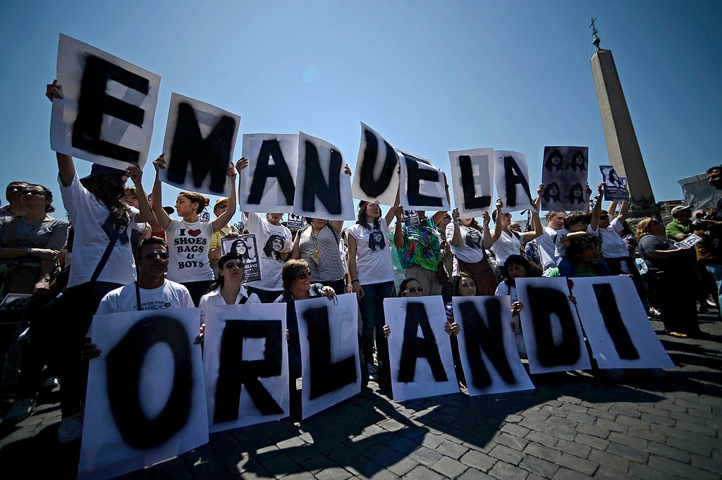 Demonstrators hold letters reading Emanuela Orlandi’s name during a 2012 protest