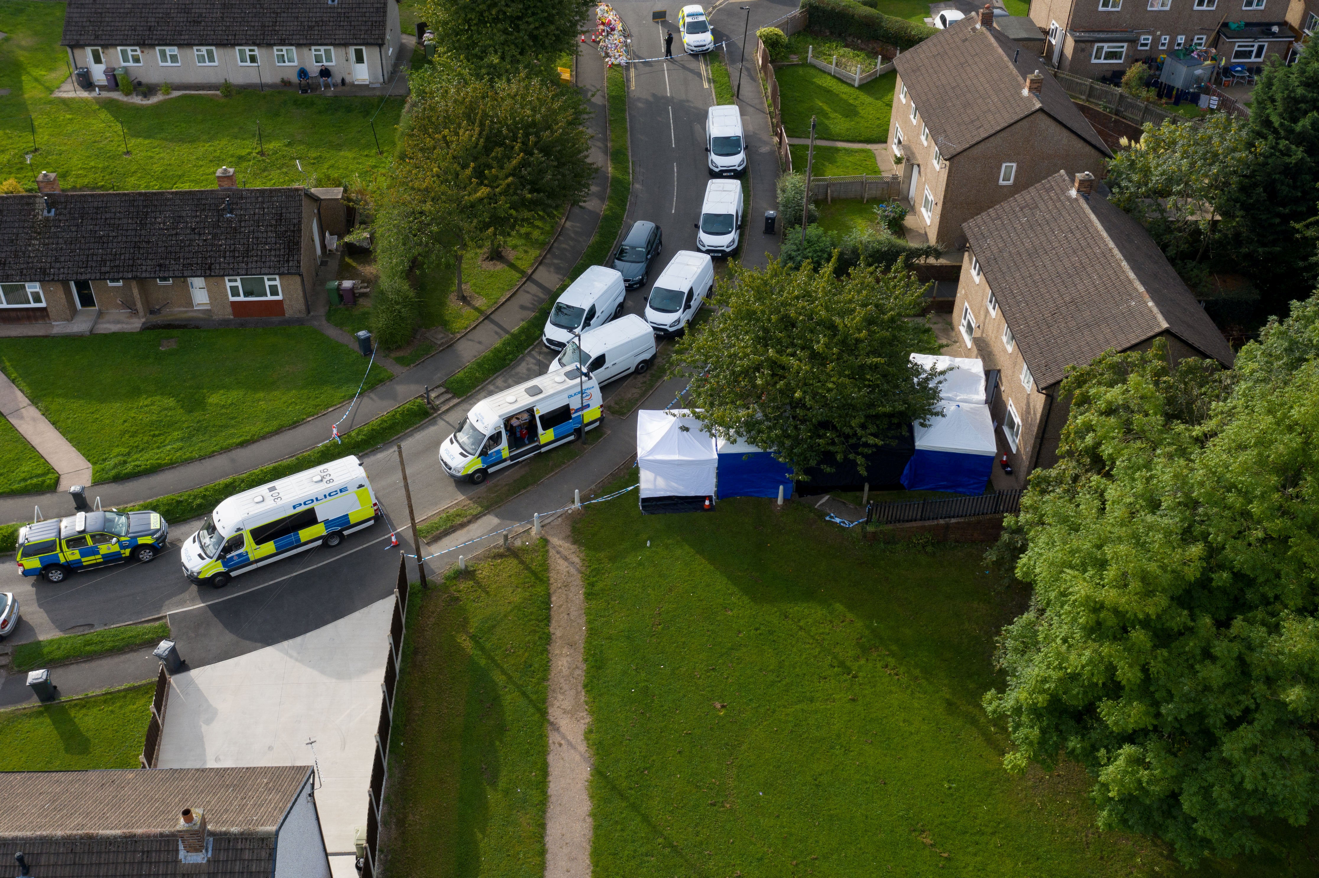 Police outside Harris’s home in Killamarsh after the murders