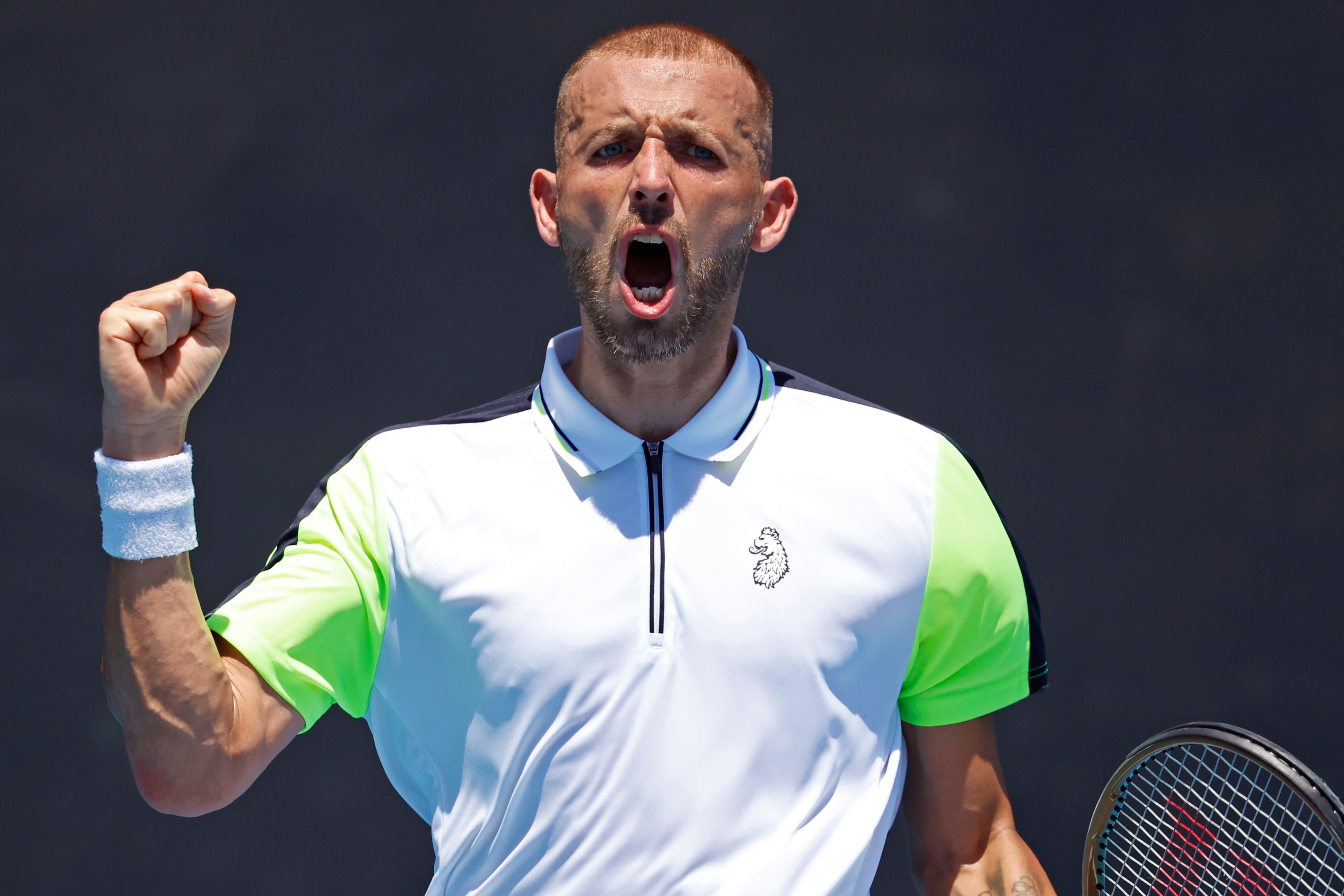 Dan Evans clenches his fist during his victory over Facundo Bagnis (Asanka Brendon Ratnayake/AP)