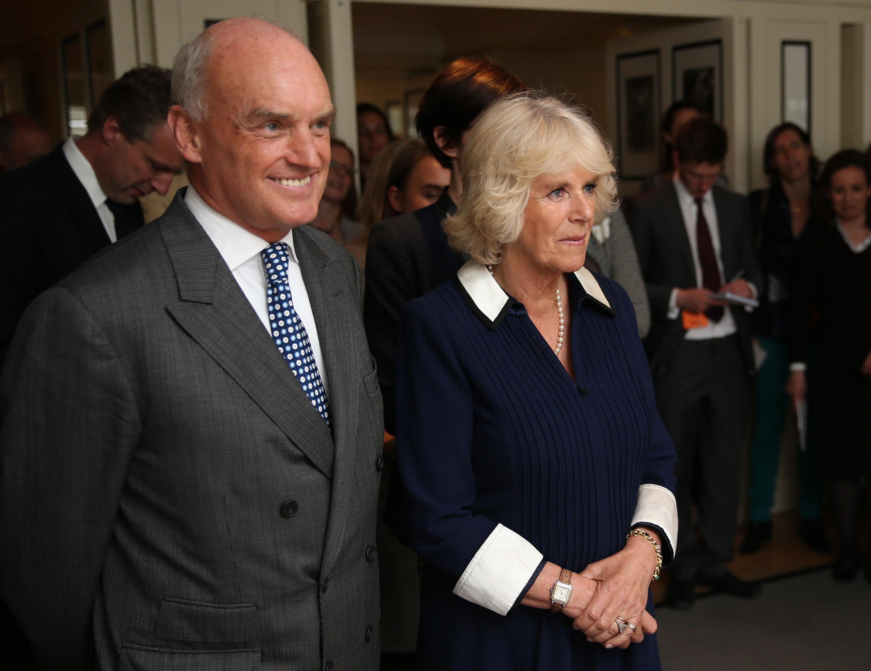 The Duchess of Cornwall and Nicholas Coleridge, president of Conde Nast International, during a charity tea party at Vogue House