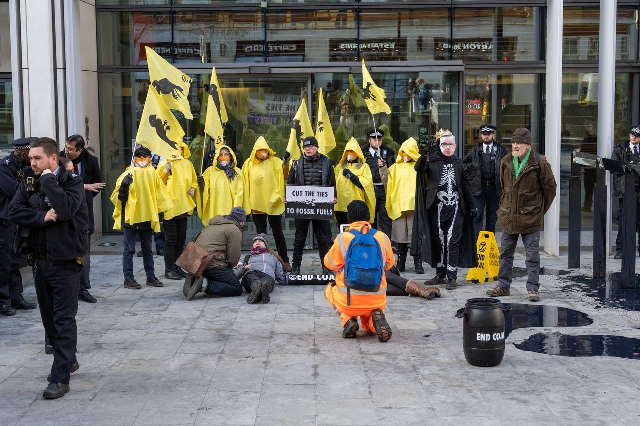 Police stand by as XR activists storm the streets outside Mr Gove’s office