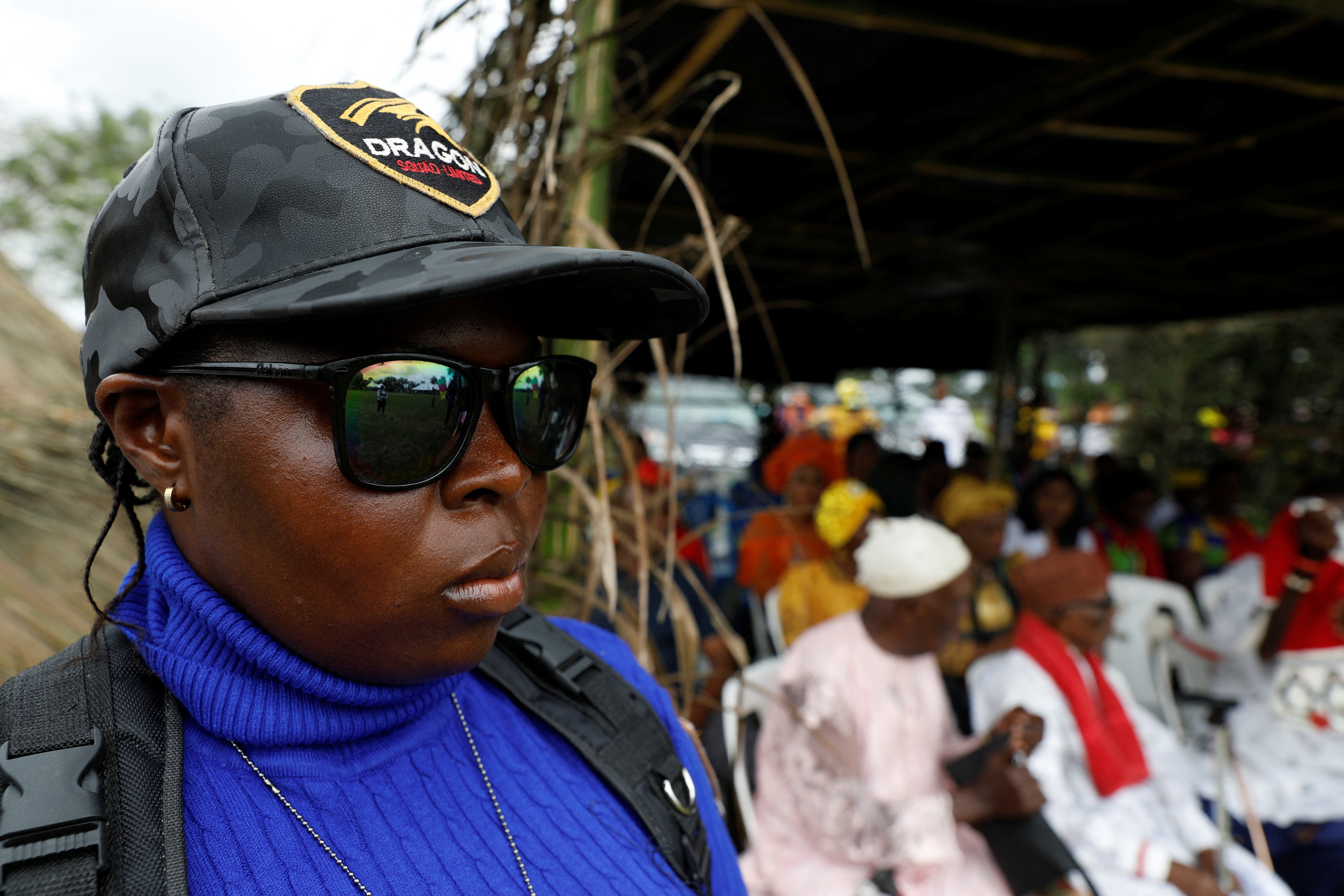 Peace stands guard at a coronation event in Uyo