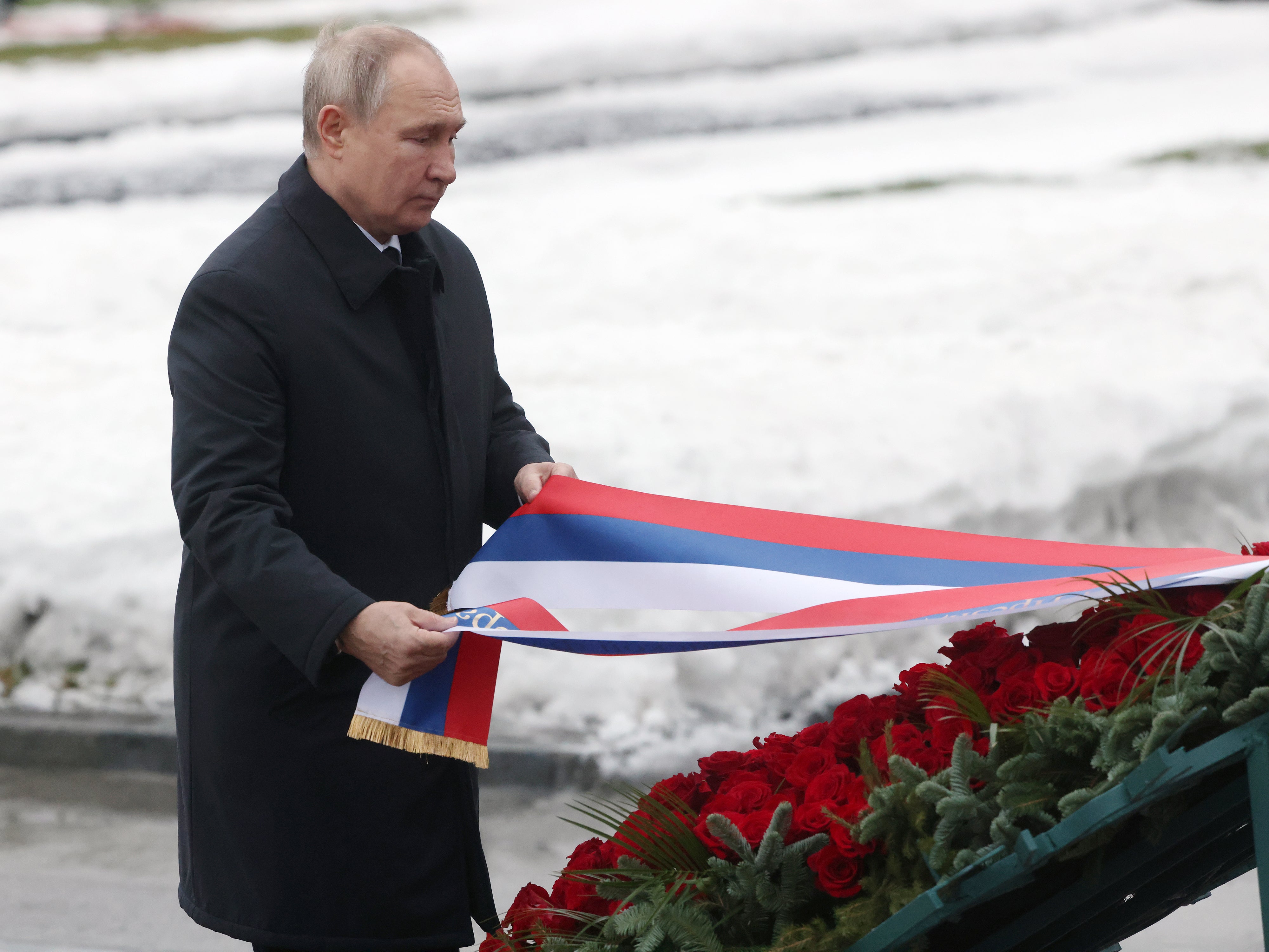 Putin attends a wreath laying ceremony marking the anniversary of the siege of Leningrad