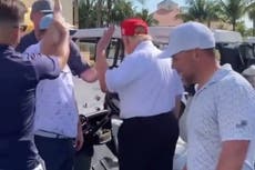 Awkward video shows Trump ducking a high five from admirer