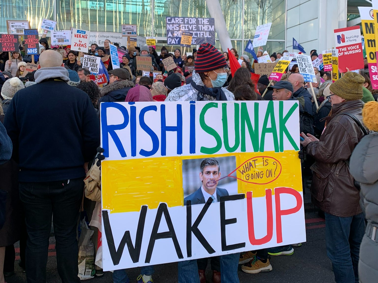 Health workers outside University College London Hospital calling for the Prime Minister to “wake up”