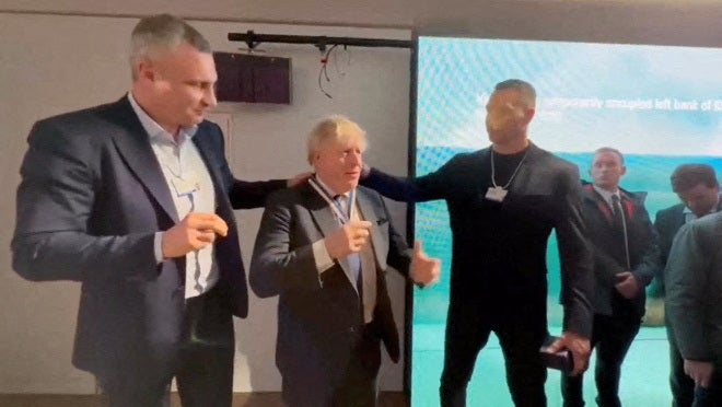 Boris Johnson receives the title of "Honorary Citizen of Kyiv” from Mayor of Kyiv Vitali Klitschko, in Davos