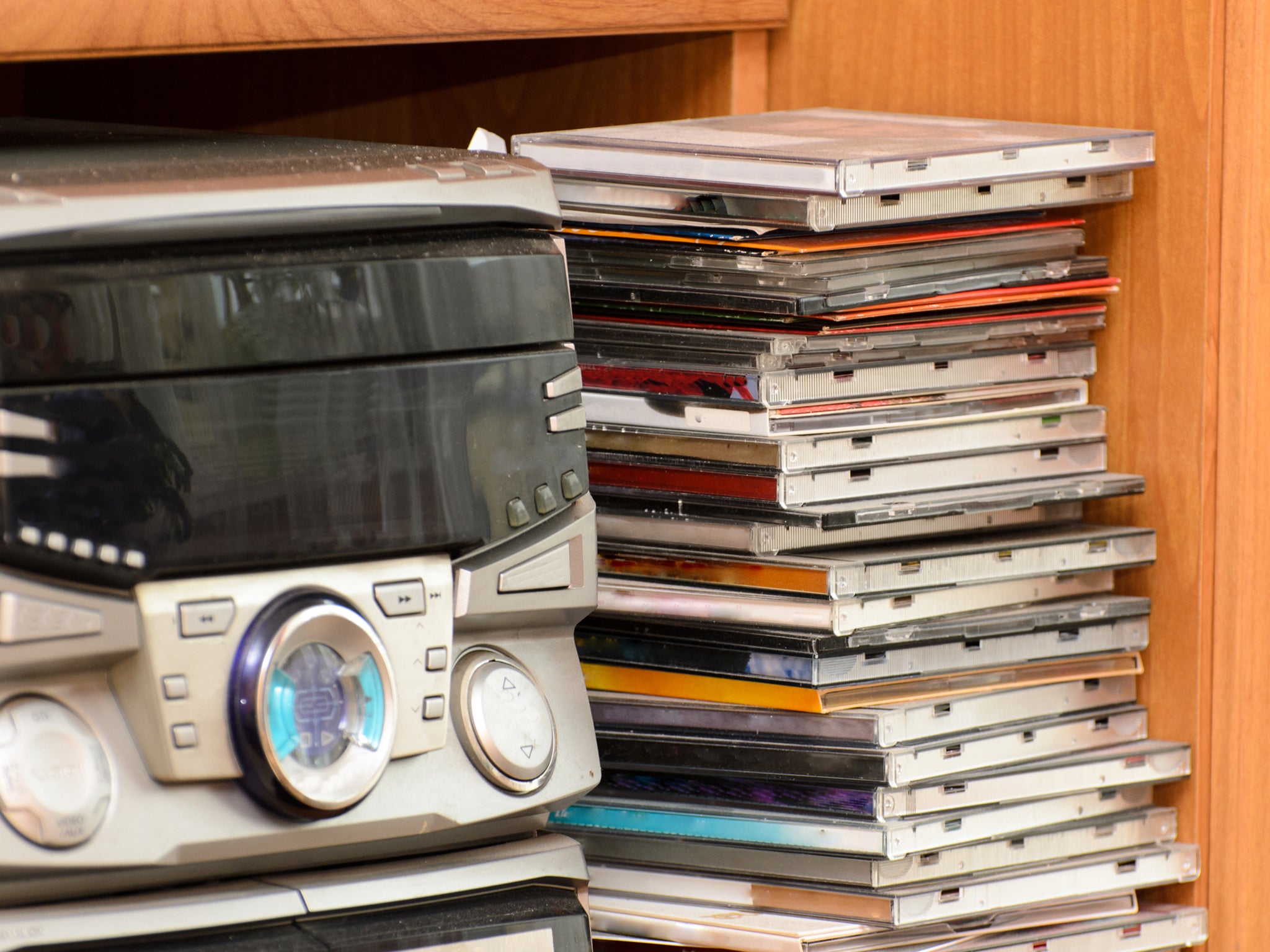 CDs and a CD player, may they rest in place