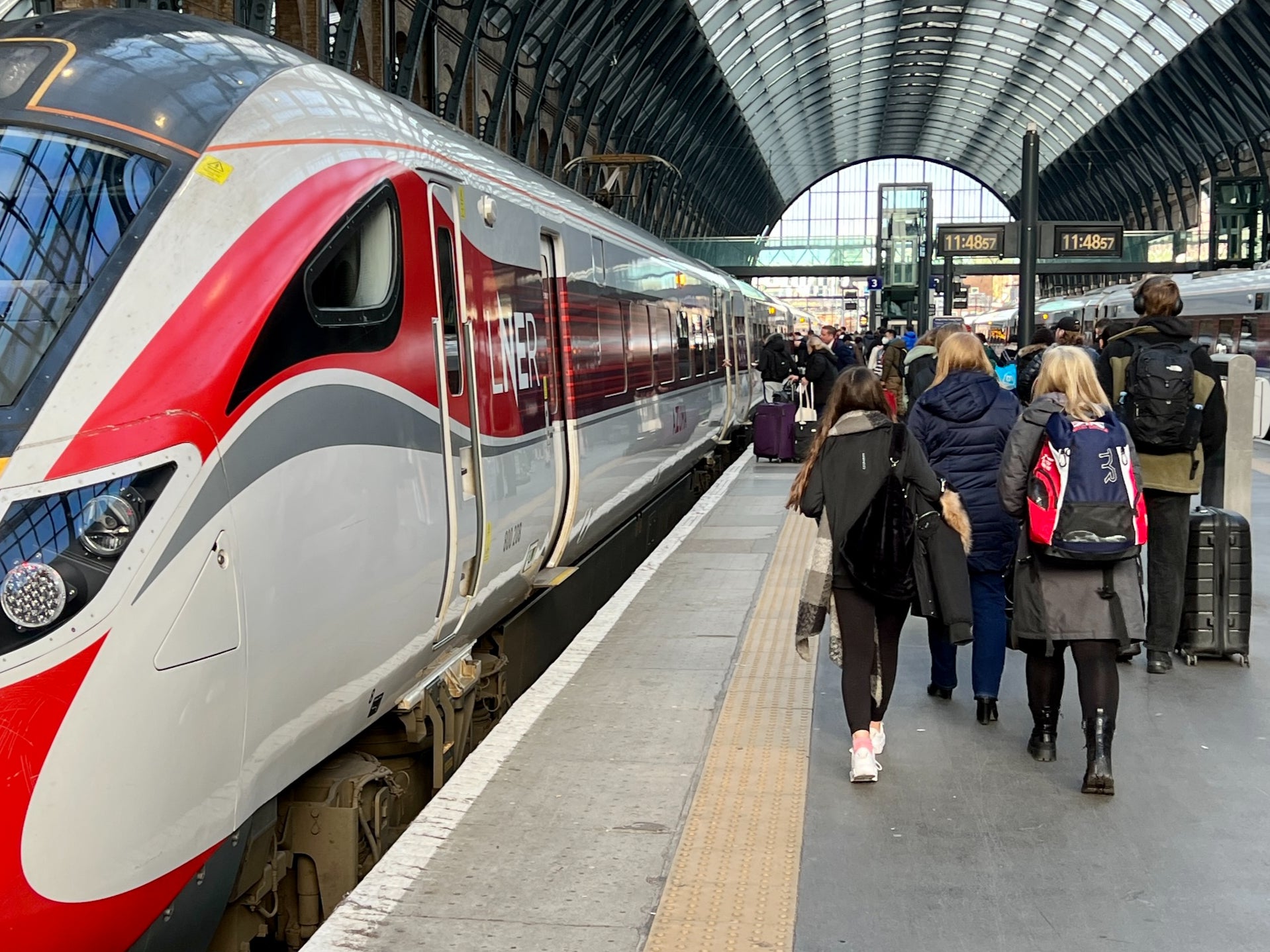 Light at the end of the tunnel? Passengers boarding an LNER train at London King's Cross