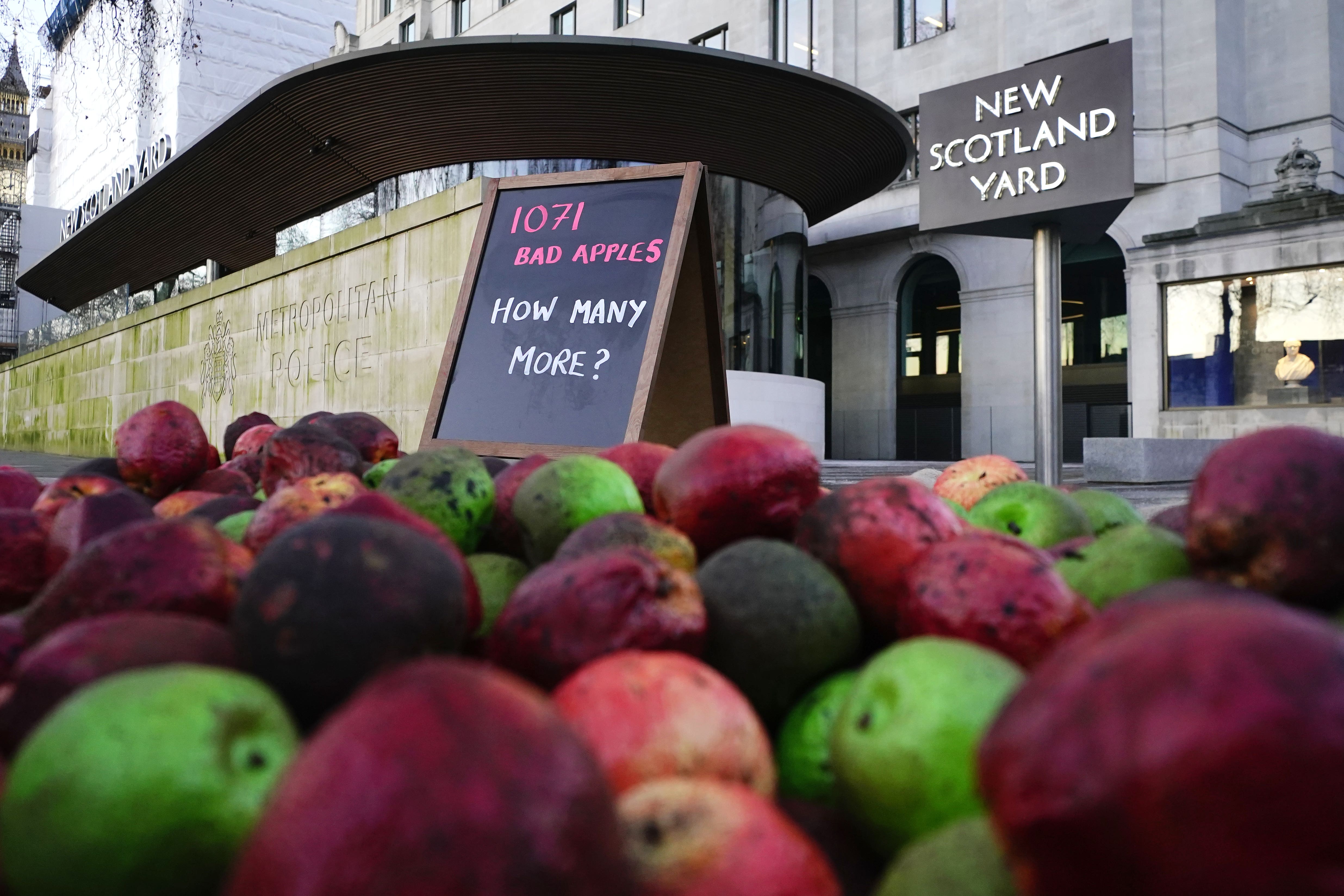 Rotten apples placed outside New Scotland Yard as part of a protest