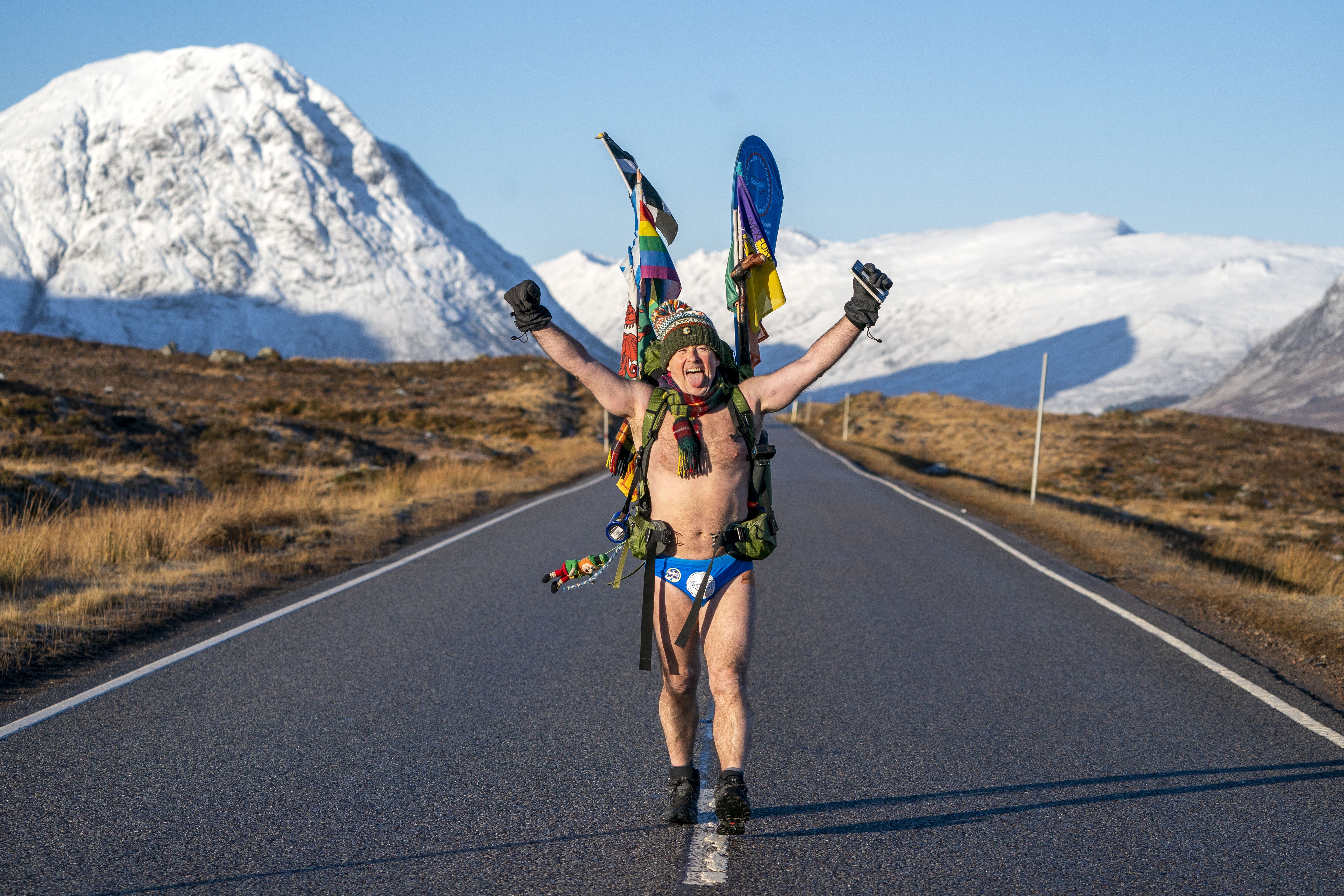 Mick Cullen, otherwise known as Speedo Mick, walks through Glencoe in sub-zero temperatures (Jane Barlow/PA)