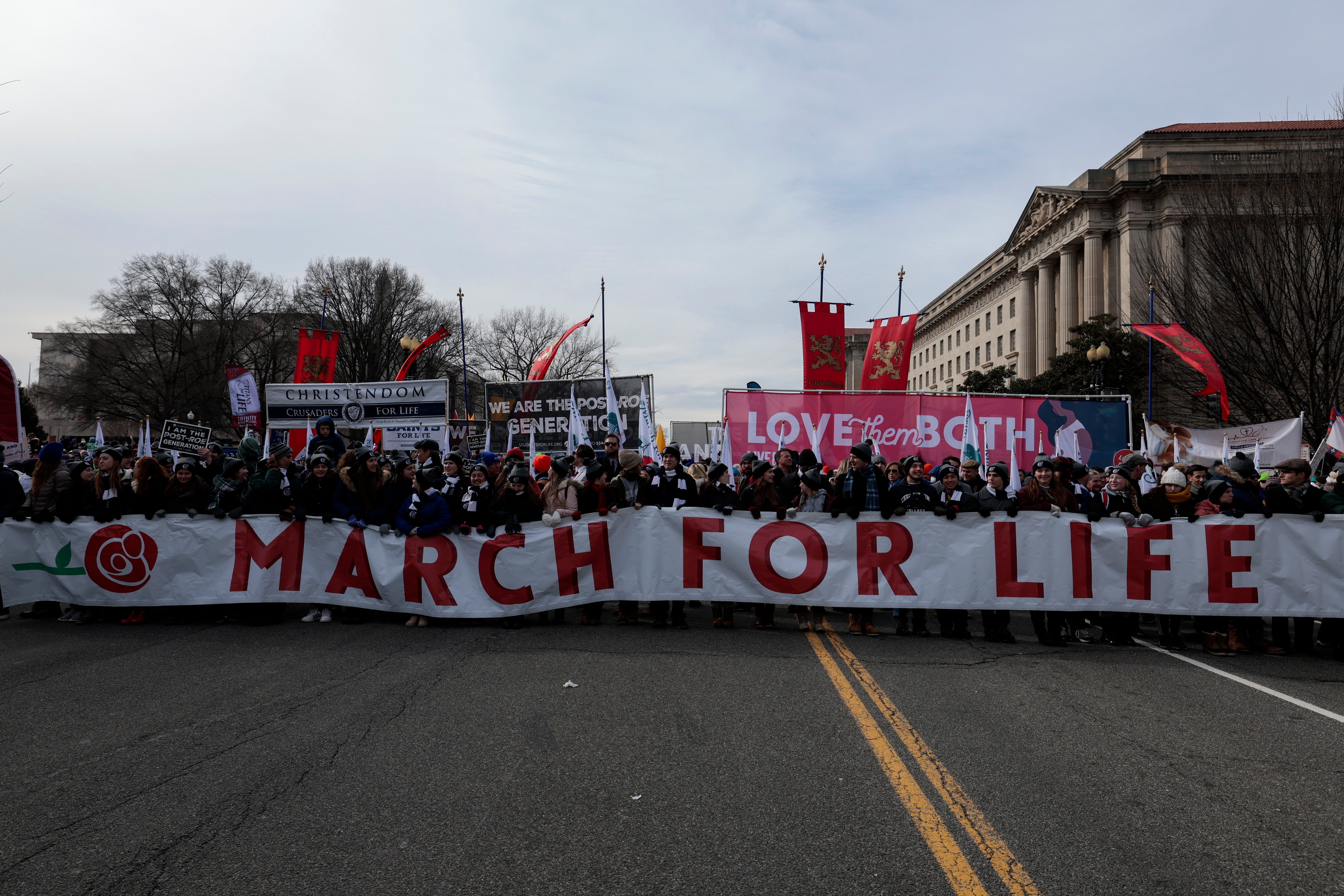 Anti-abortion activists march during the 49th annual March for Life rally on the National Mall on January 21, 2022 in Washington, DC. The rally draws activists from around the country who are calling on the U.S. Supreme Court to overturn the Roe v. Wade decision that legalized abortion nationwide.