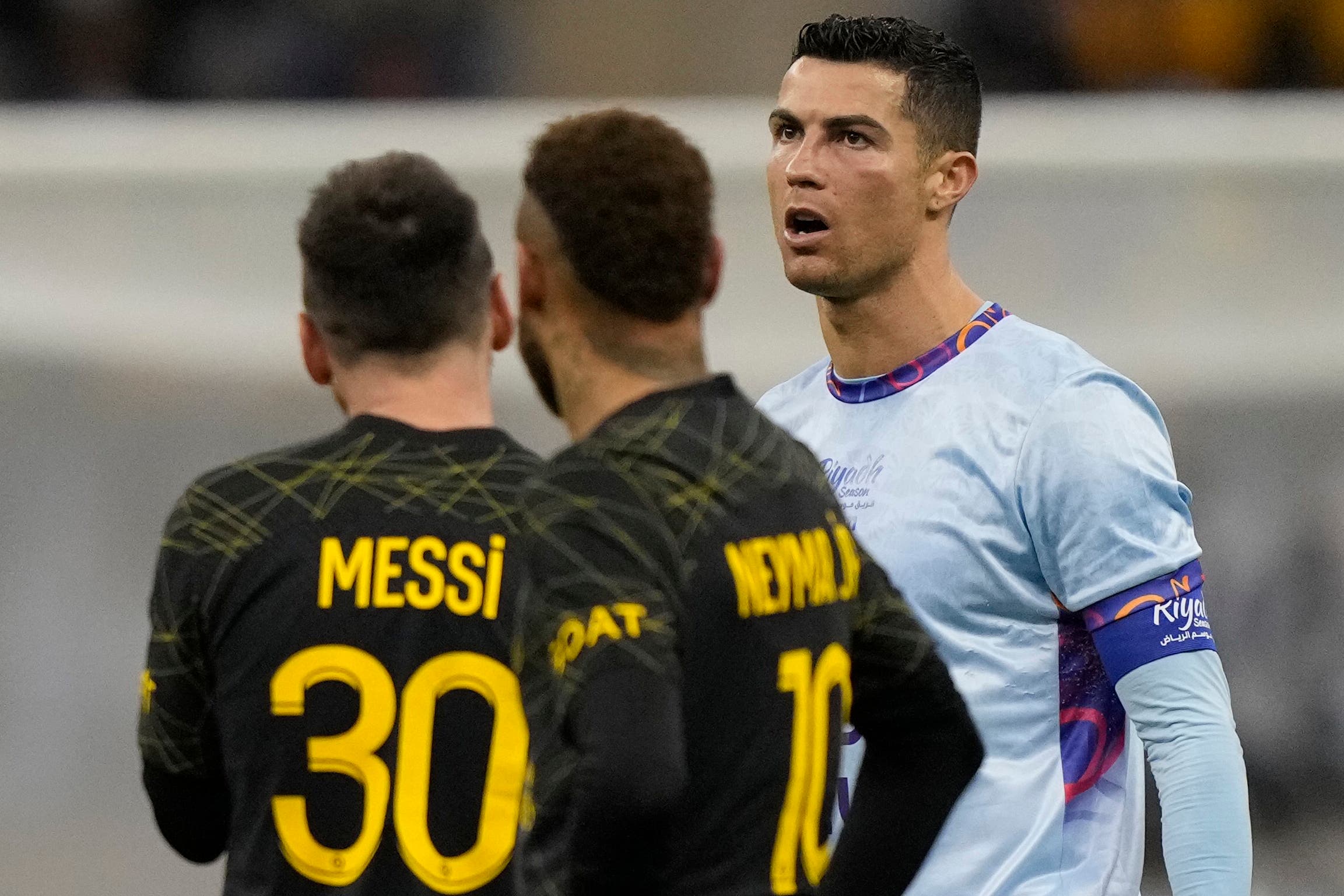 Cristiano Ronaldo (right) scored twice on his first appearance in Saudi Arabia with Lionel Messi (left) also on target (Hussein Malla/AP)