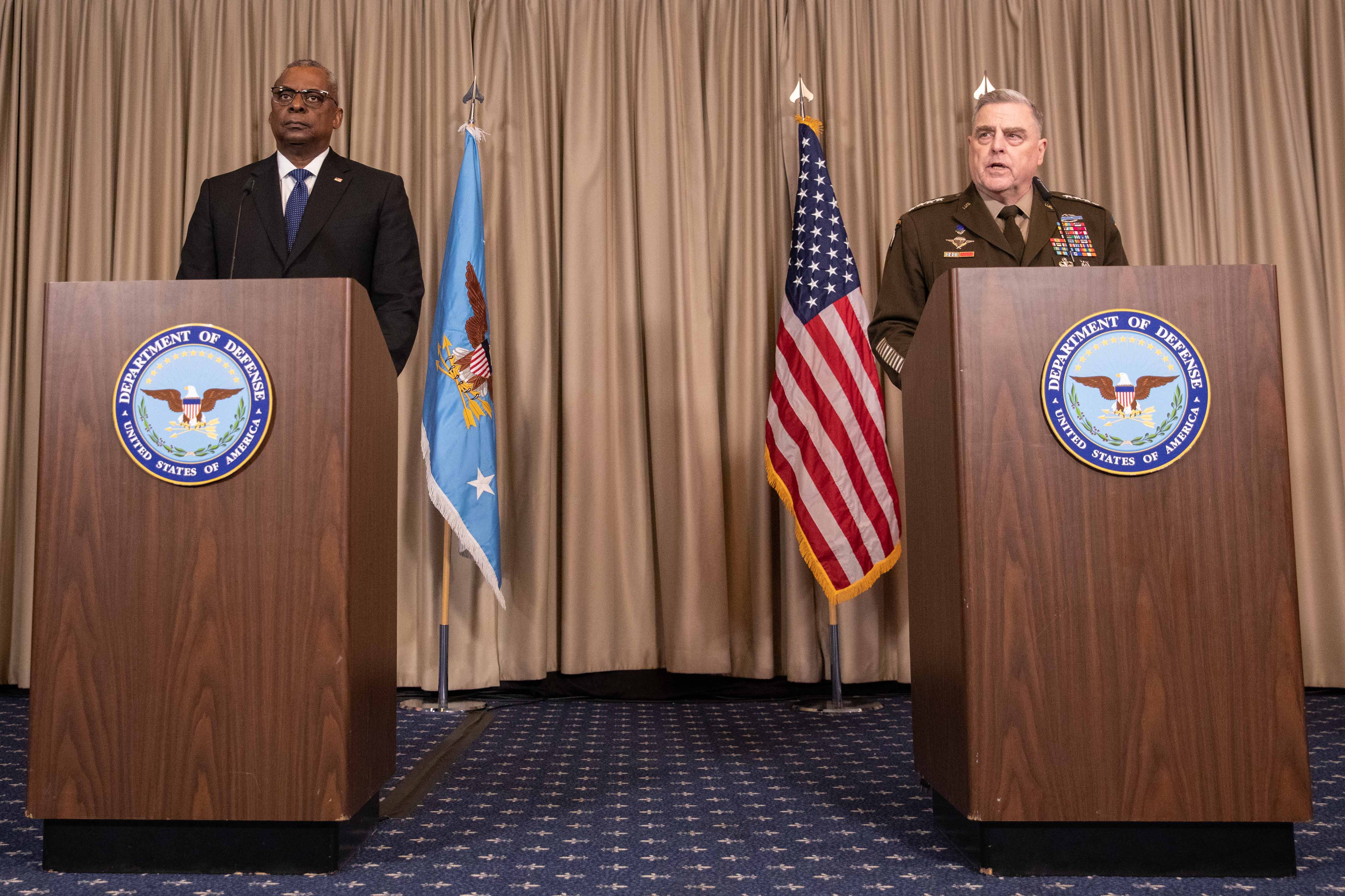 US Secretary of Defense Lloyd Austin (L) and Chairman of the Joint Chiefs of Staff Mark Milley spoke to media at US Air Base in Ramstein