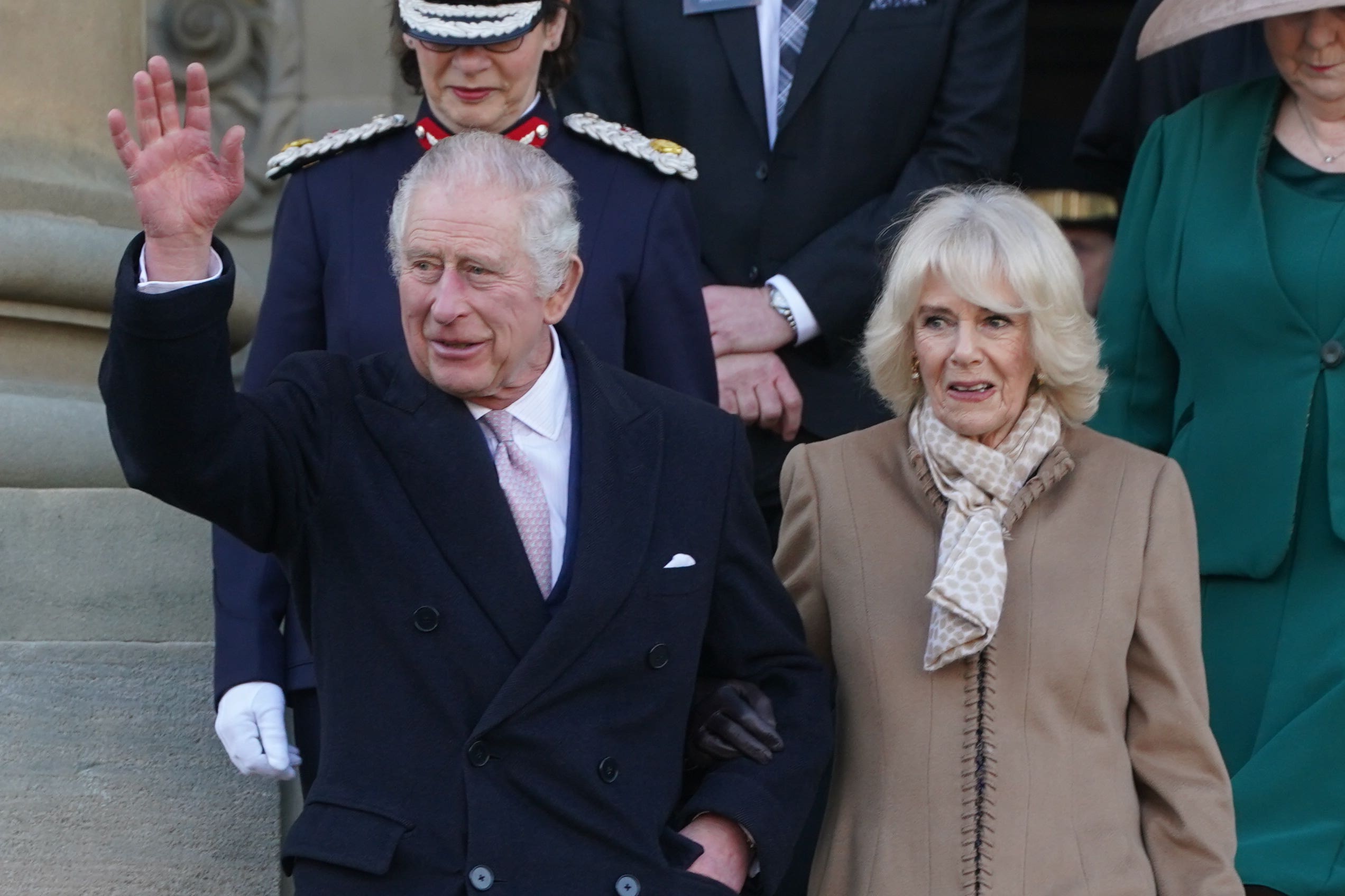 The King and the Queen Consort leave after a visit to Bolton Town Hall where they attended a reception to meet representatives from the community, as part of a visit to Greater Manchester (Owen Humphreys/PA)