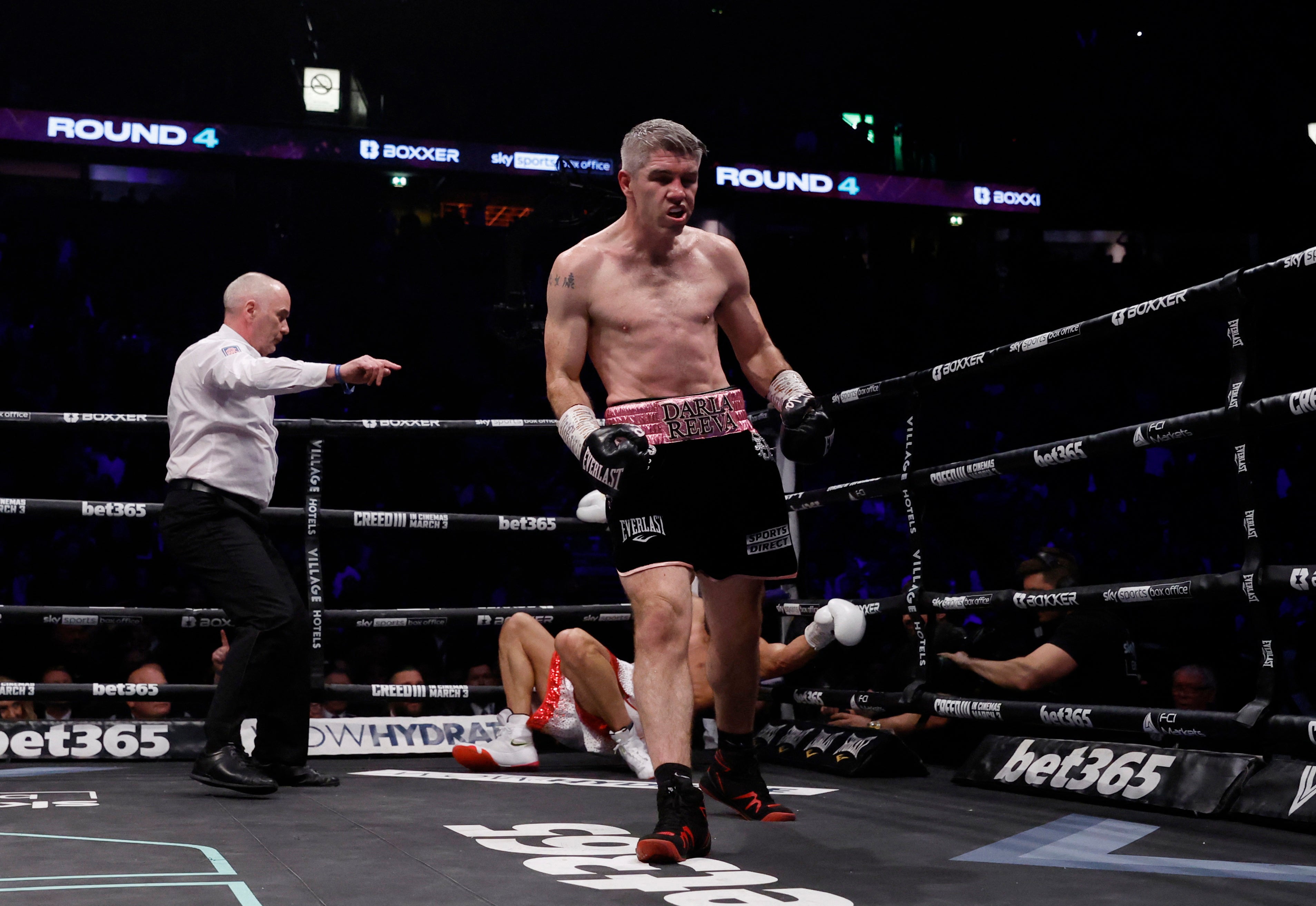 Smith reacts to his first knockdown of Eubank Jr