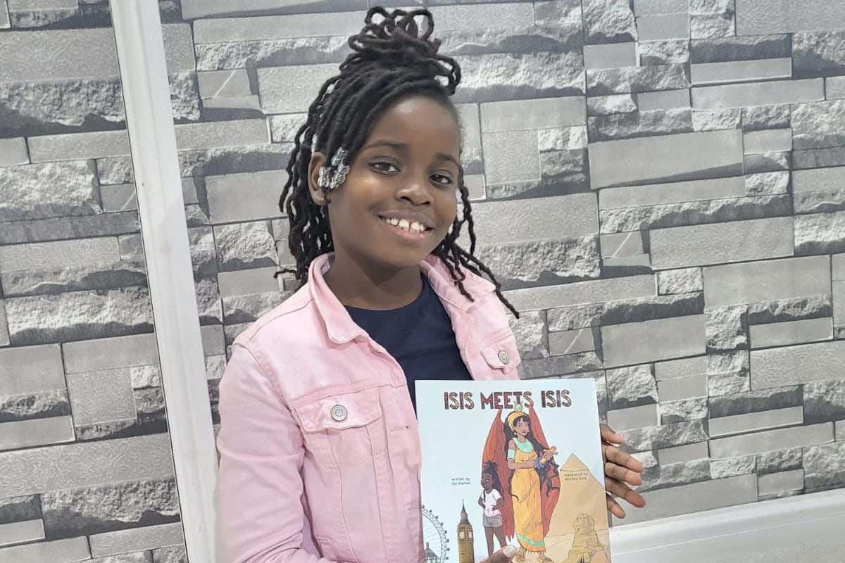 Isis Damali with her book (Subira Damali/Enomwoyi Damali/PA)