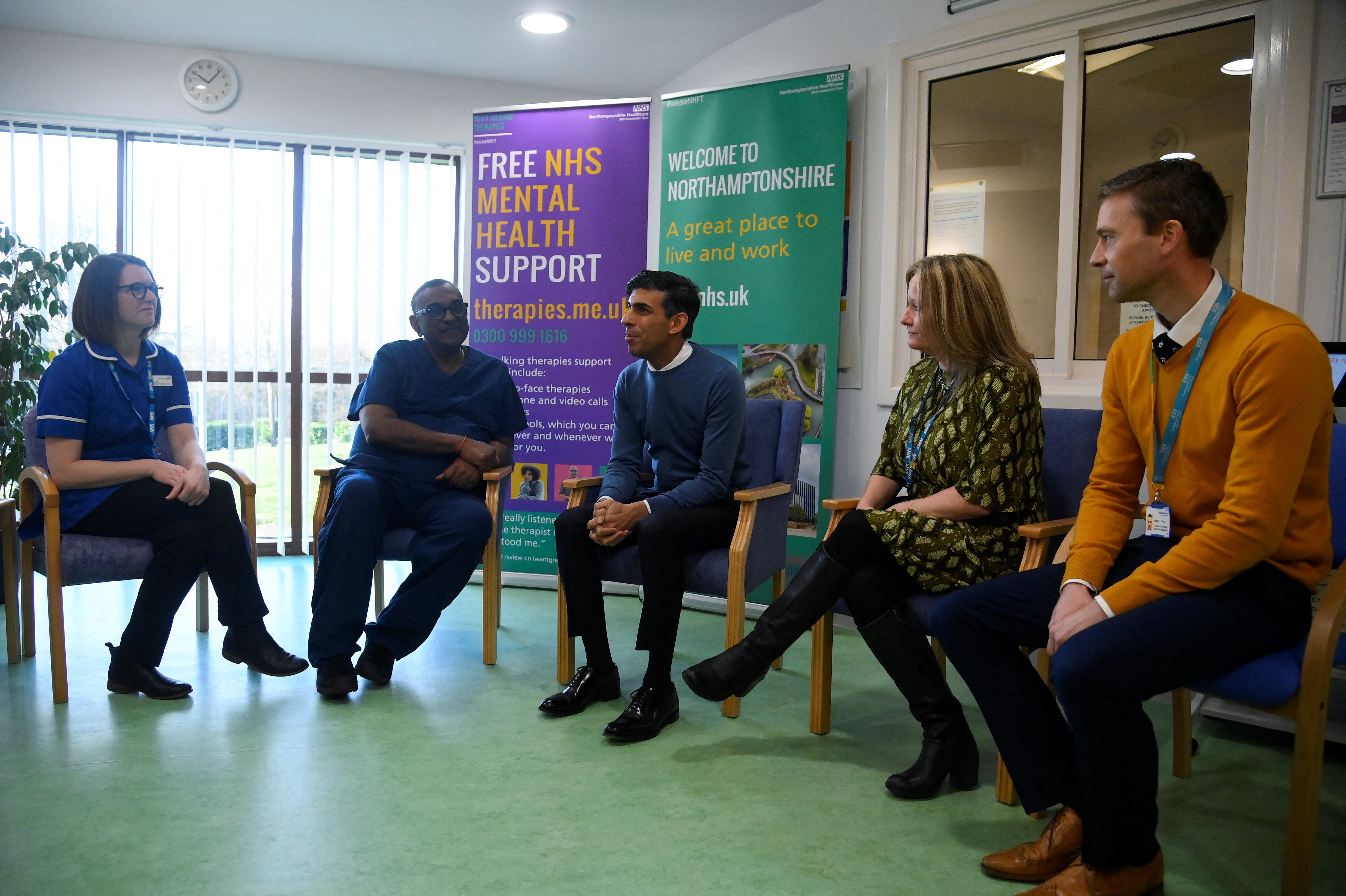 Rishi Sunak talks to doctors and clinicians during his visit to Berrywood Hospital