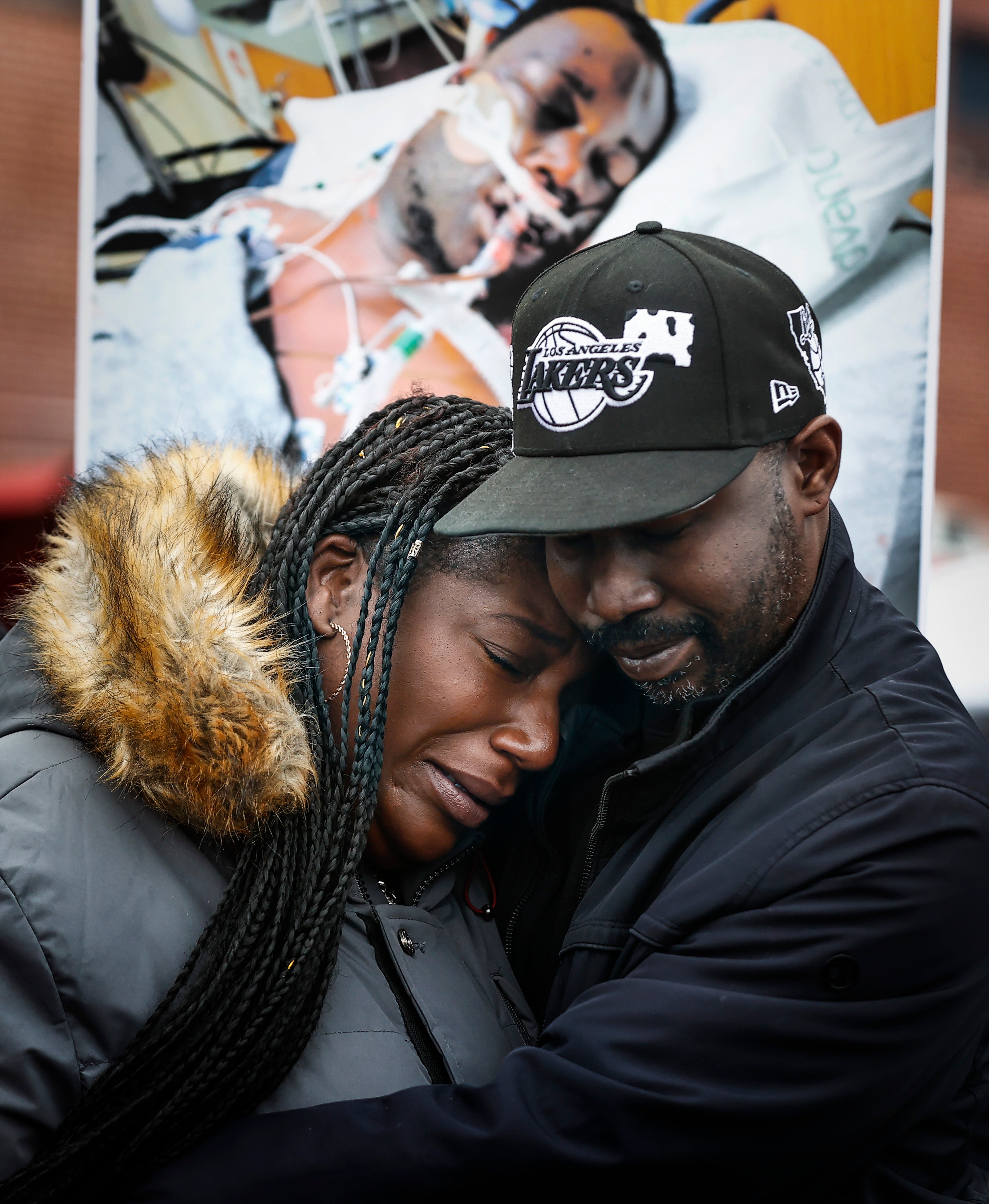 Kenyana Dixon is comforted during a rally for her brother Tyre Nichols at the National Civil Rights Museum on 16 January