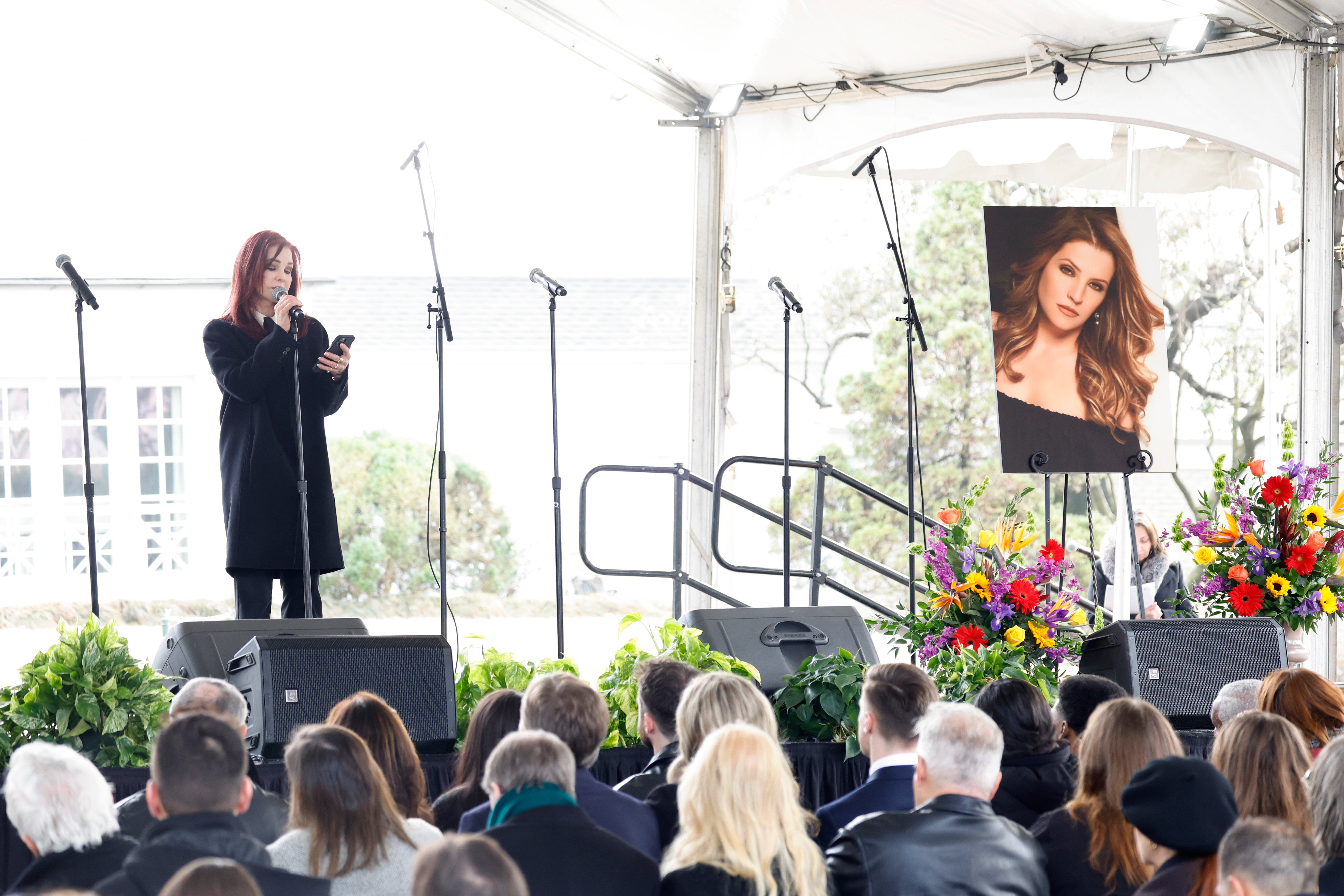 Priscilla Presley speaking at her daughter’s memorial