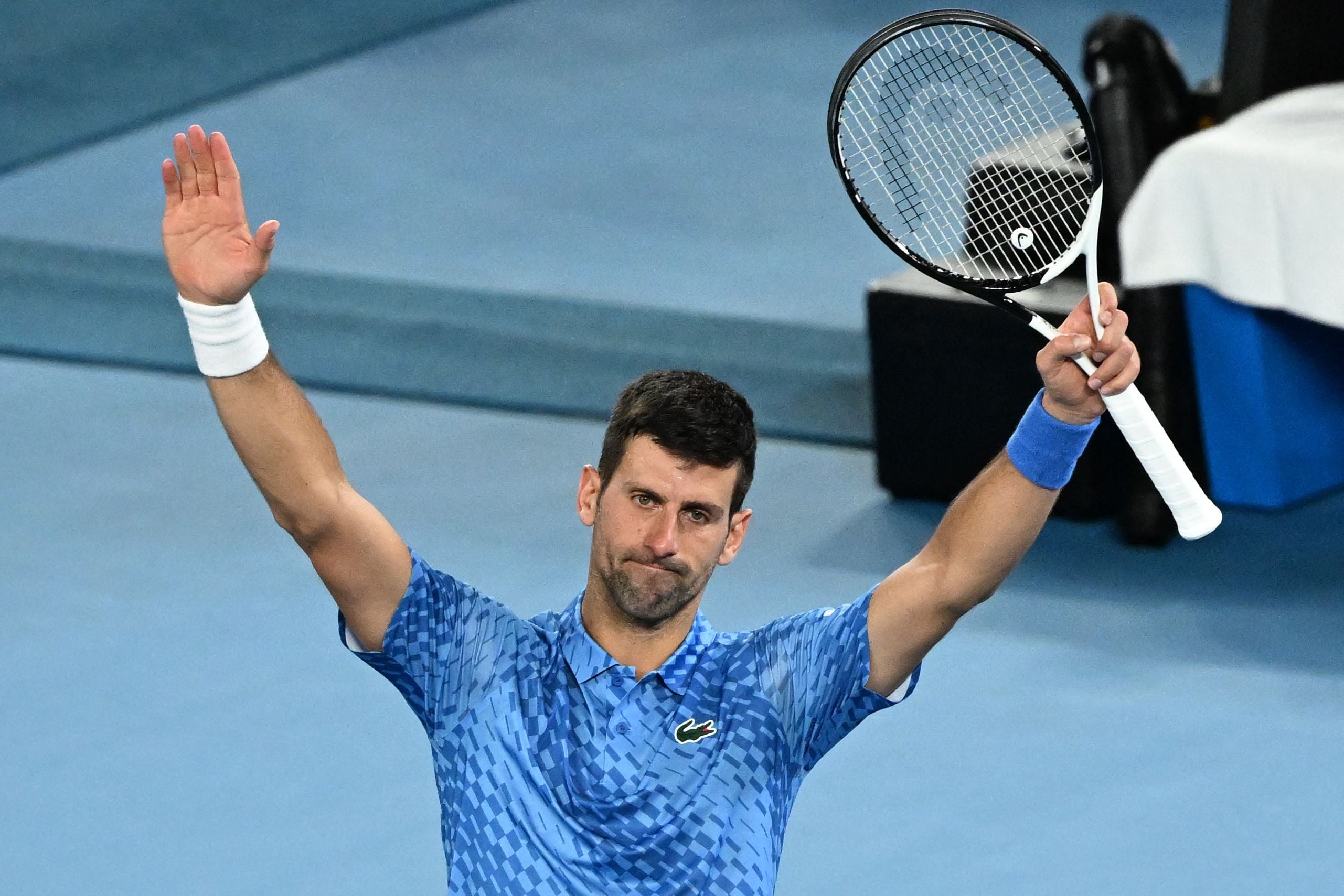 Serbia's Novak Djokovic celebrates after victory against Australia's Alex De Minaur