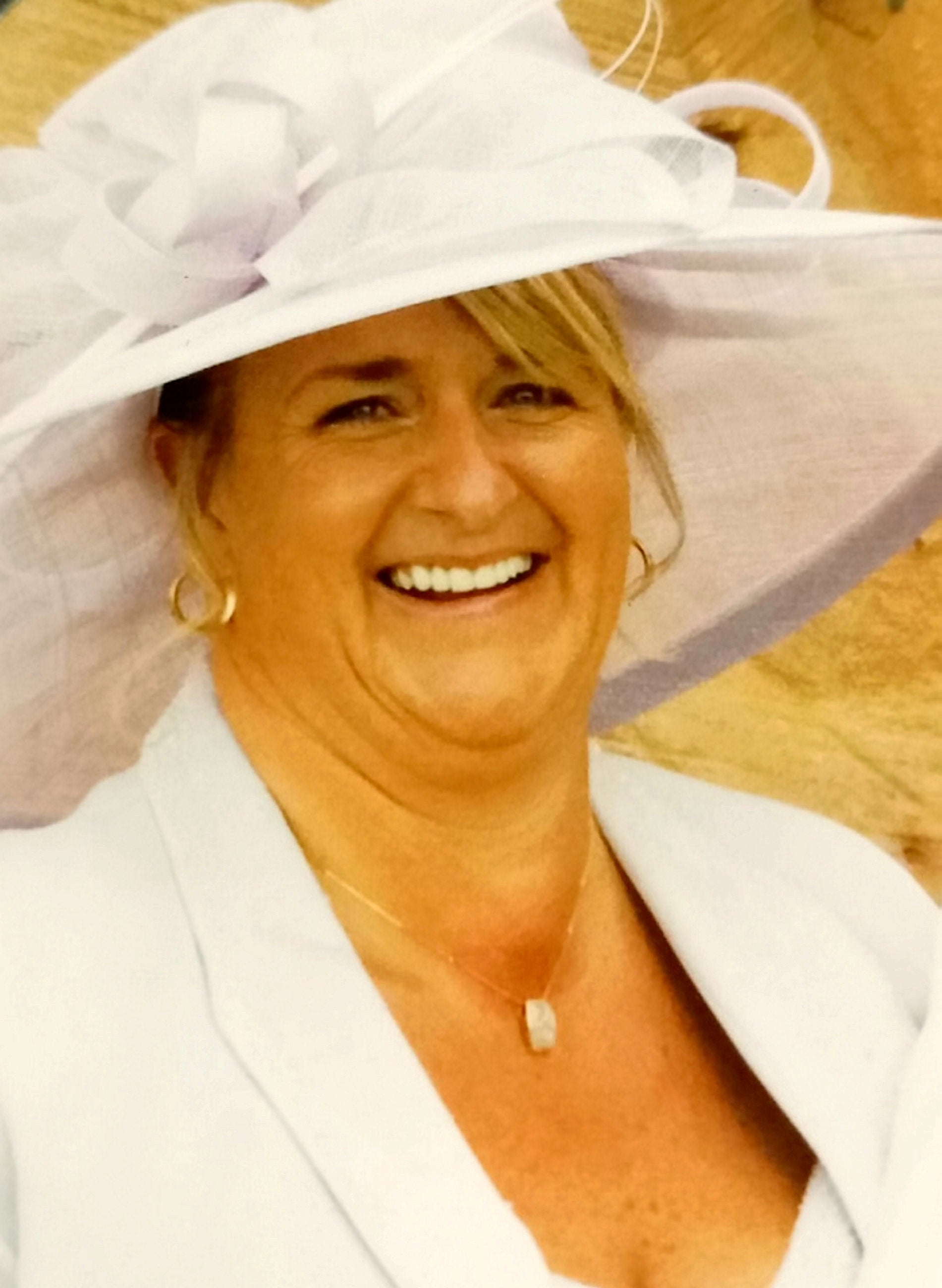 Olive Bruce, 61, at daughters wedding after having dental work