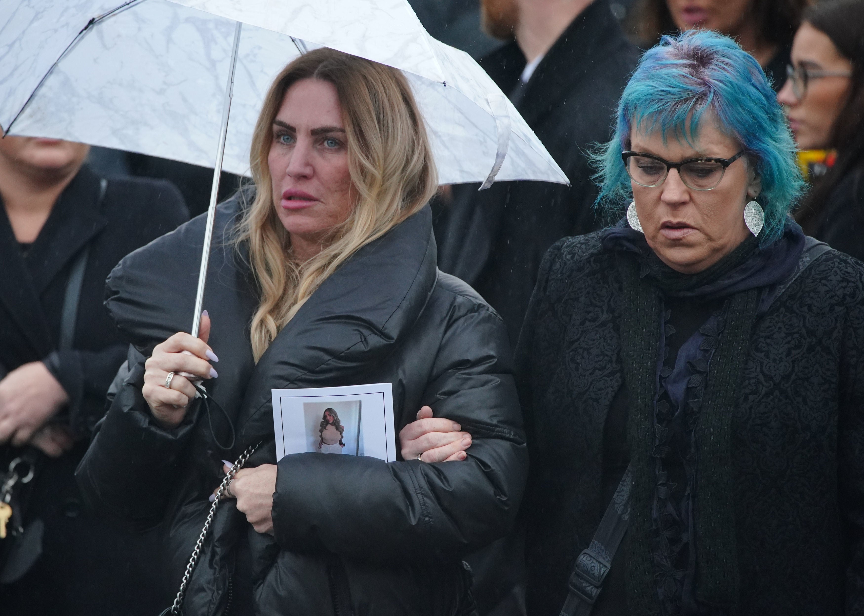 Mourners leave the funeral service at St Nicholas’s Church, Wallasey