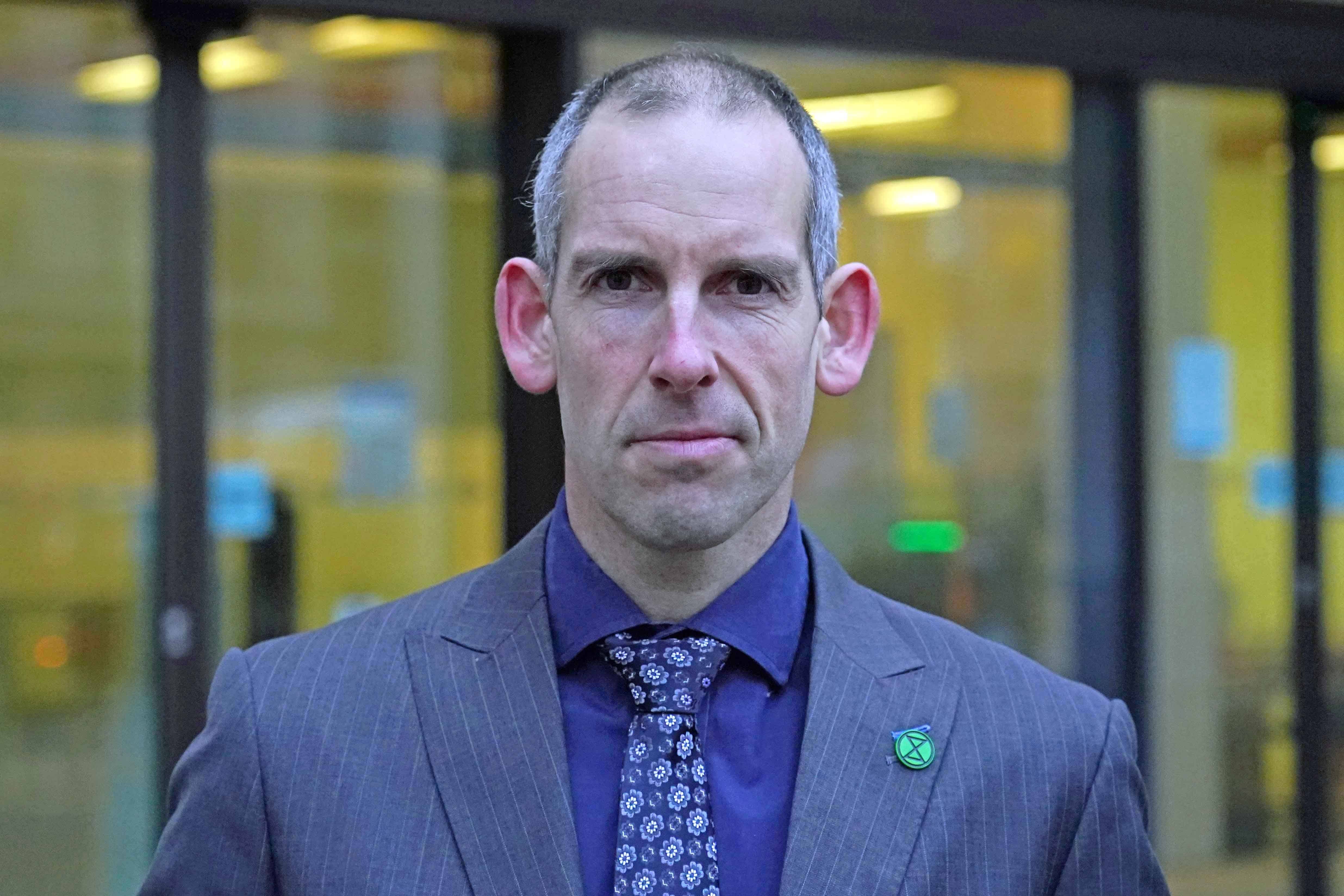 Extinction Rebellion activist Etienne Stott arrives at Westminster Magistrates’ Court (Jordan Pettitt/PA)