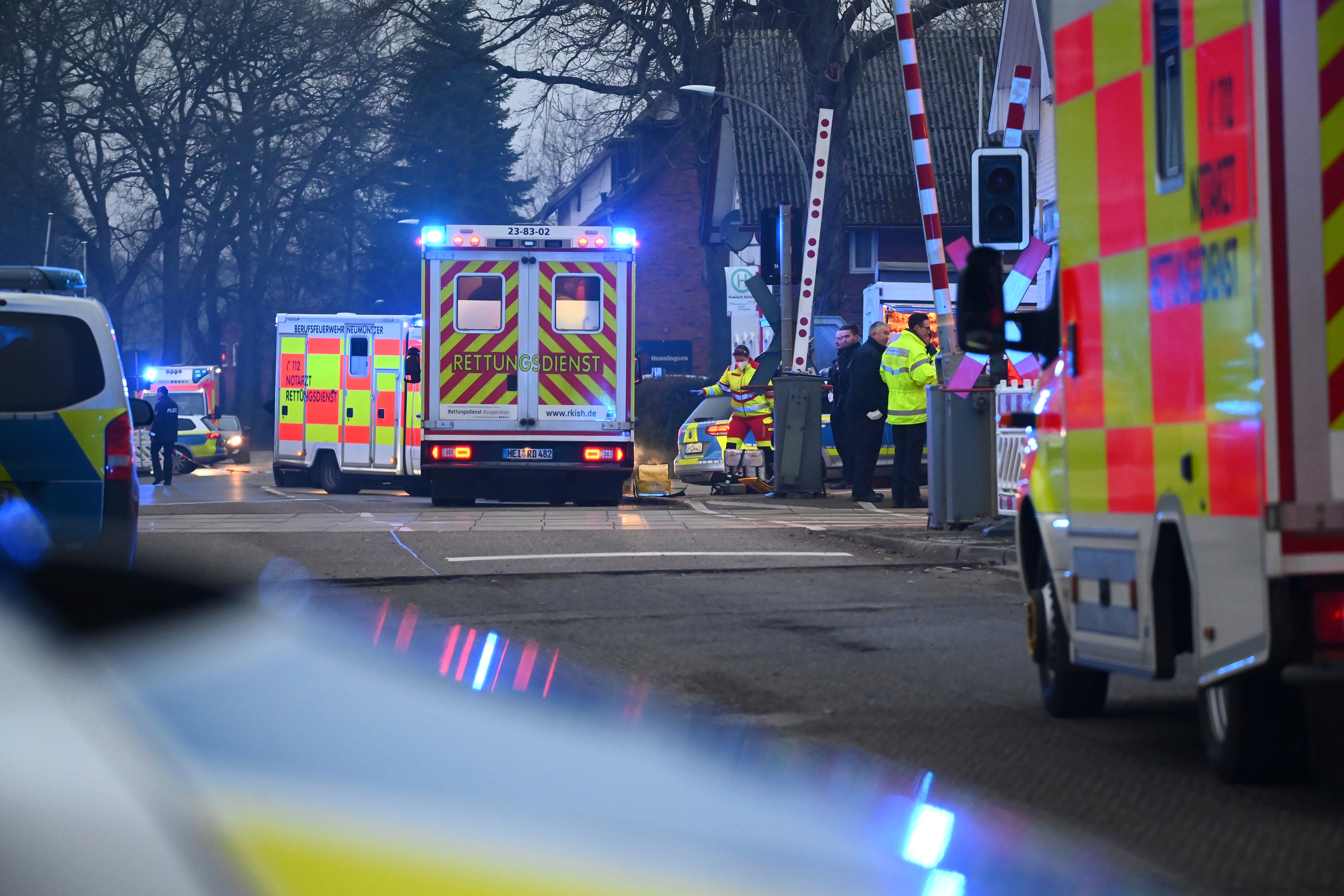 Police and rescue services near Brokstedt station in Germany after Wednesday’s attack