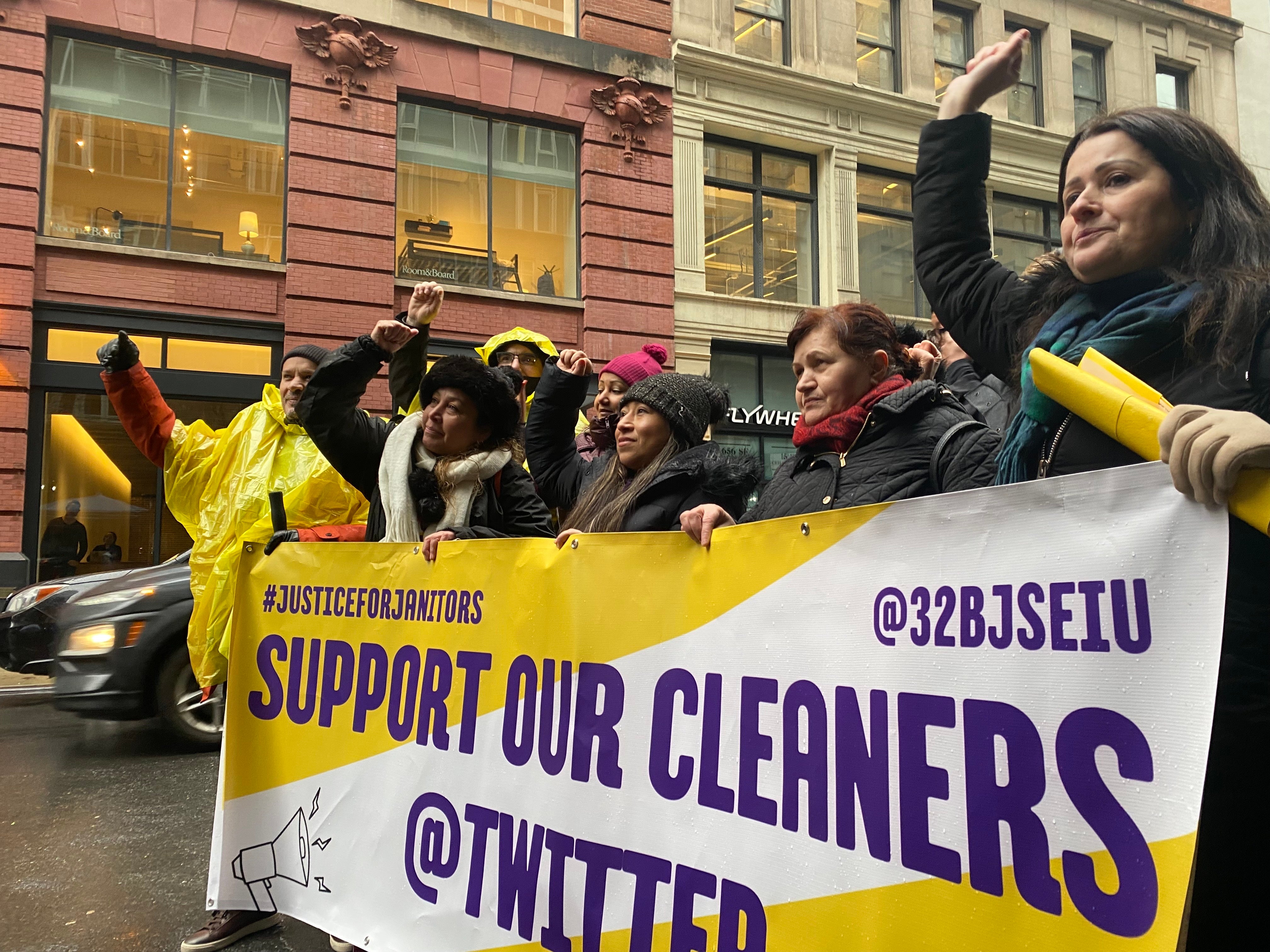 Laid-off cleaning staff and their supporters rally with their union outside Twitter’s New York City office on 25 January after they were abruptly fired on 19 December, 2022.