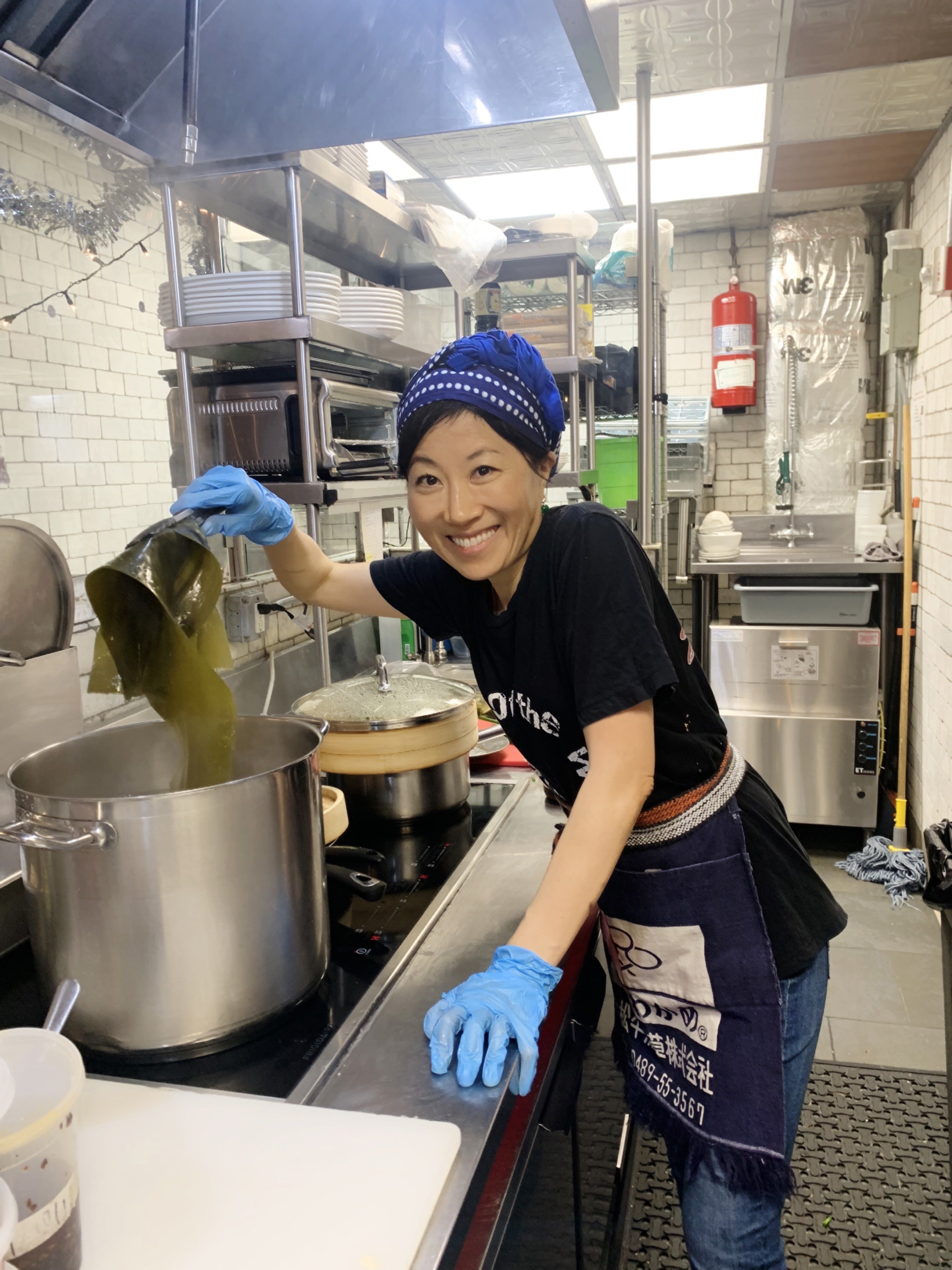 Yumi Komatsudaira prepares a Japanese dish