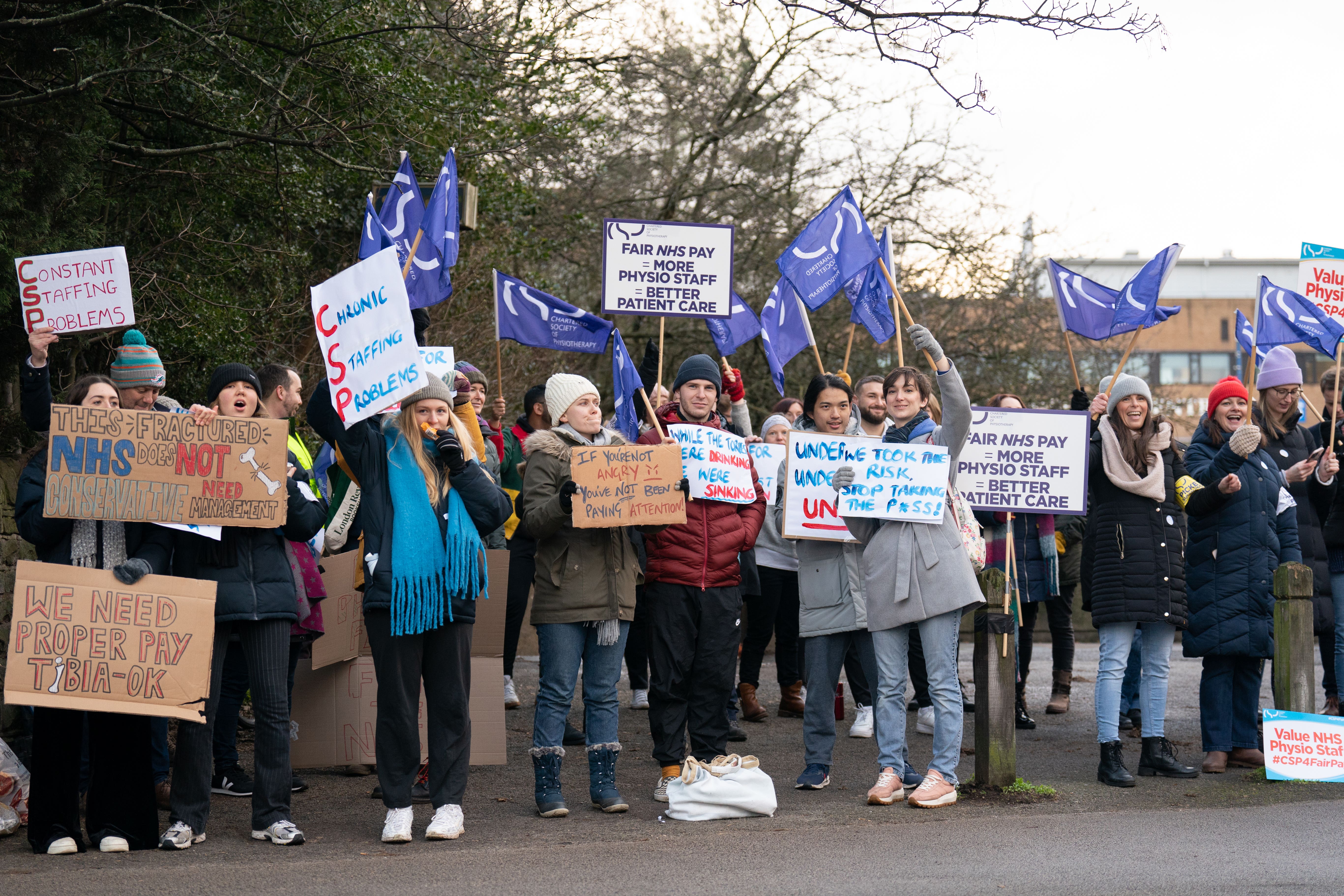 Members of the Chartered Society of Physiotherapy on the picket line outside Nottingham’s Queen’s Medical Centre in Nottingham (Joe Giddens/PA)