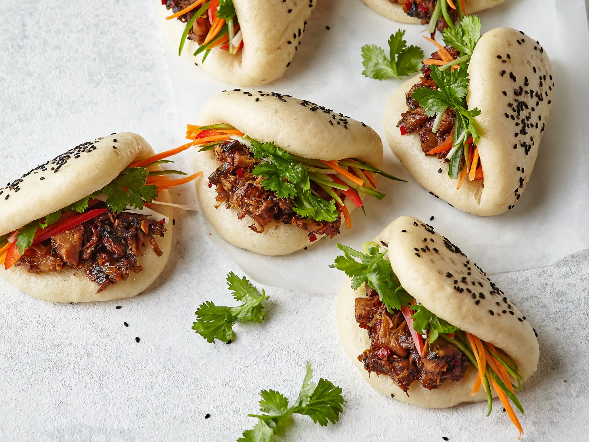 These Asian-inspired fluffy buns are filled with a sweet and sour jackfruit and crunchy salad