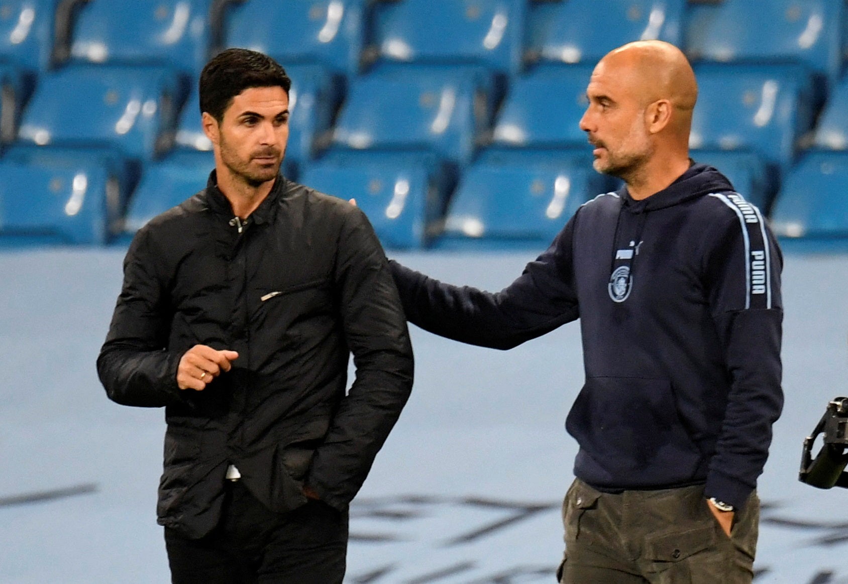 Manchester City manager Pep Guardiola and Arsenal manager Mikel Arteta