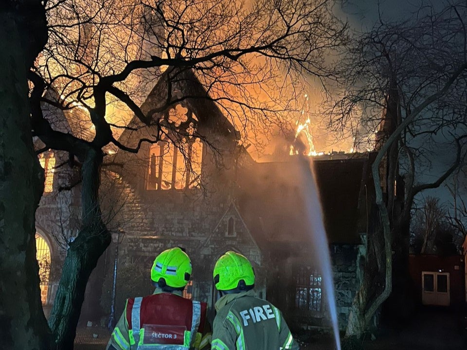 Fire rips through historic London church as heartbroken vicar watches on