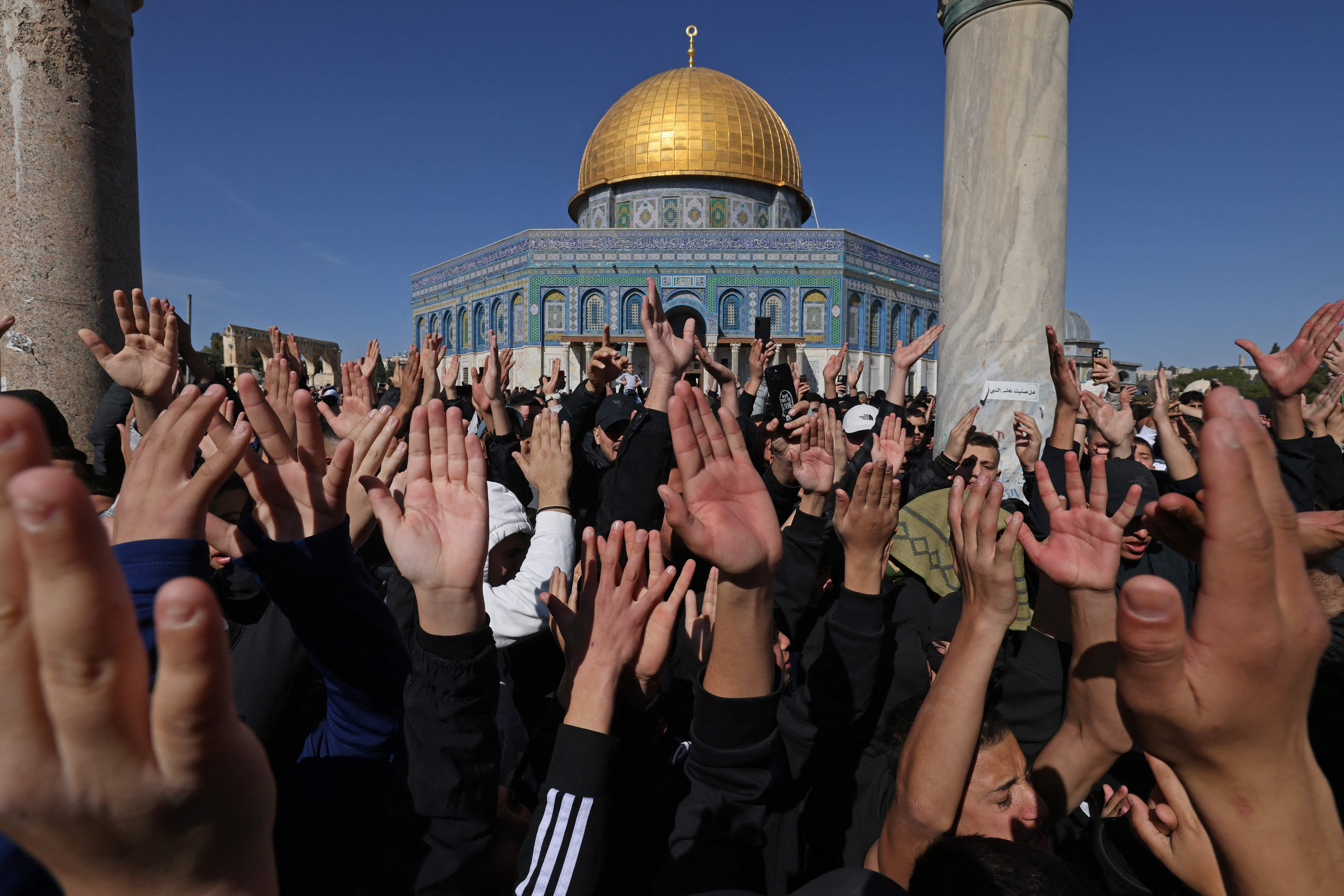 Palestinians protest in the Al-Aqsa mosques compound in Jerusalem after one of the deadliest Israeli army raids in the occupied West Bank in years