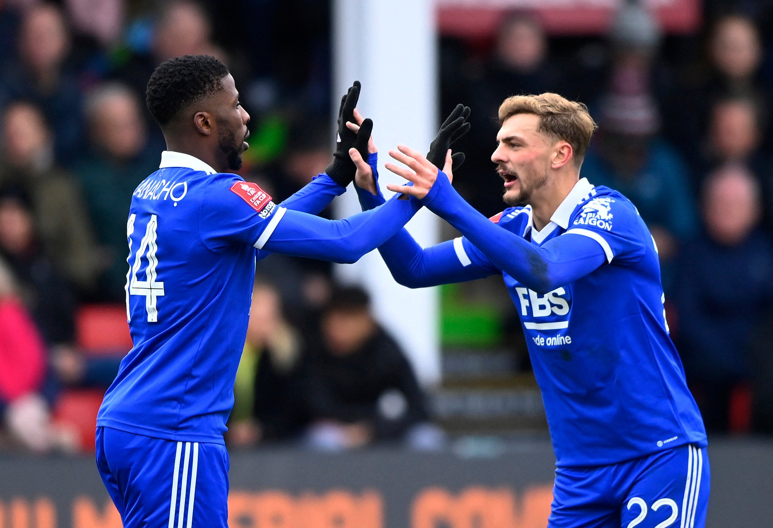 Kelechi Iheanacho celebrates with Kiernan Dewsbury-Hall