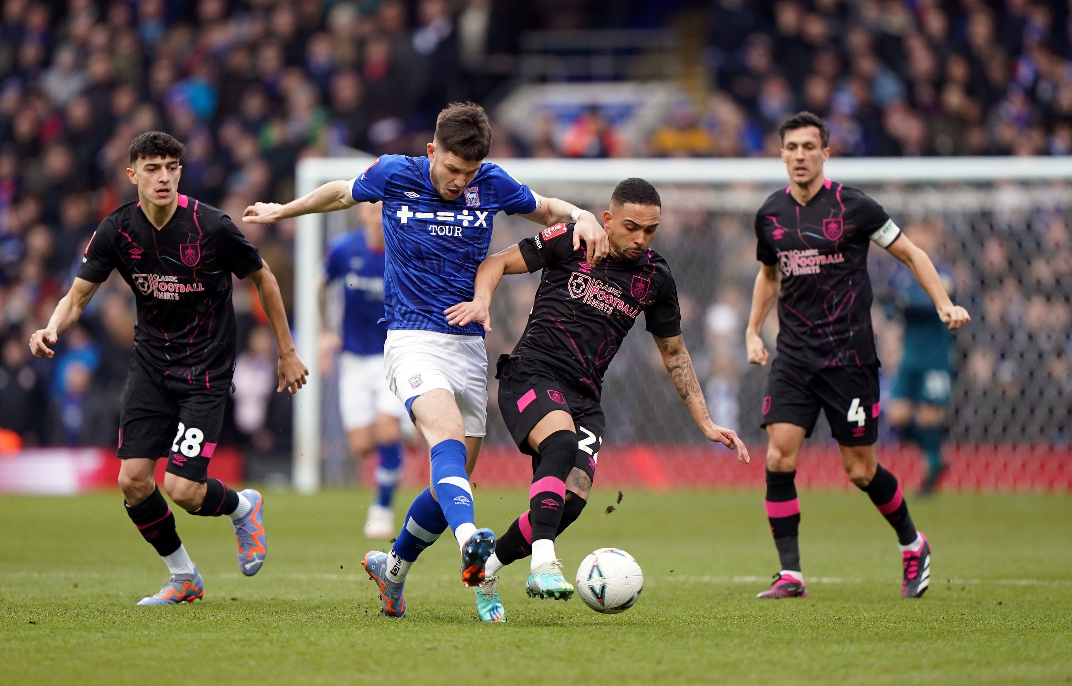 Ipswich Town’s George Hirst and Burnley’s Vitinho battle for the ball