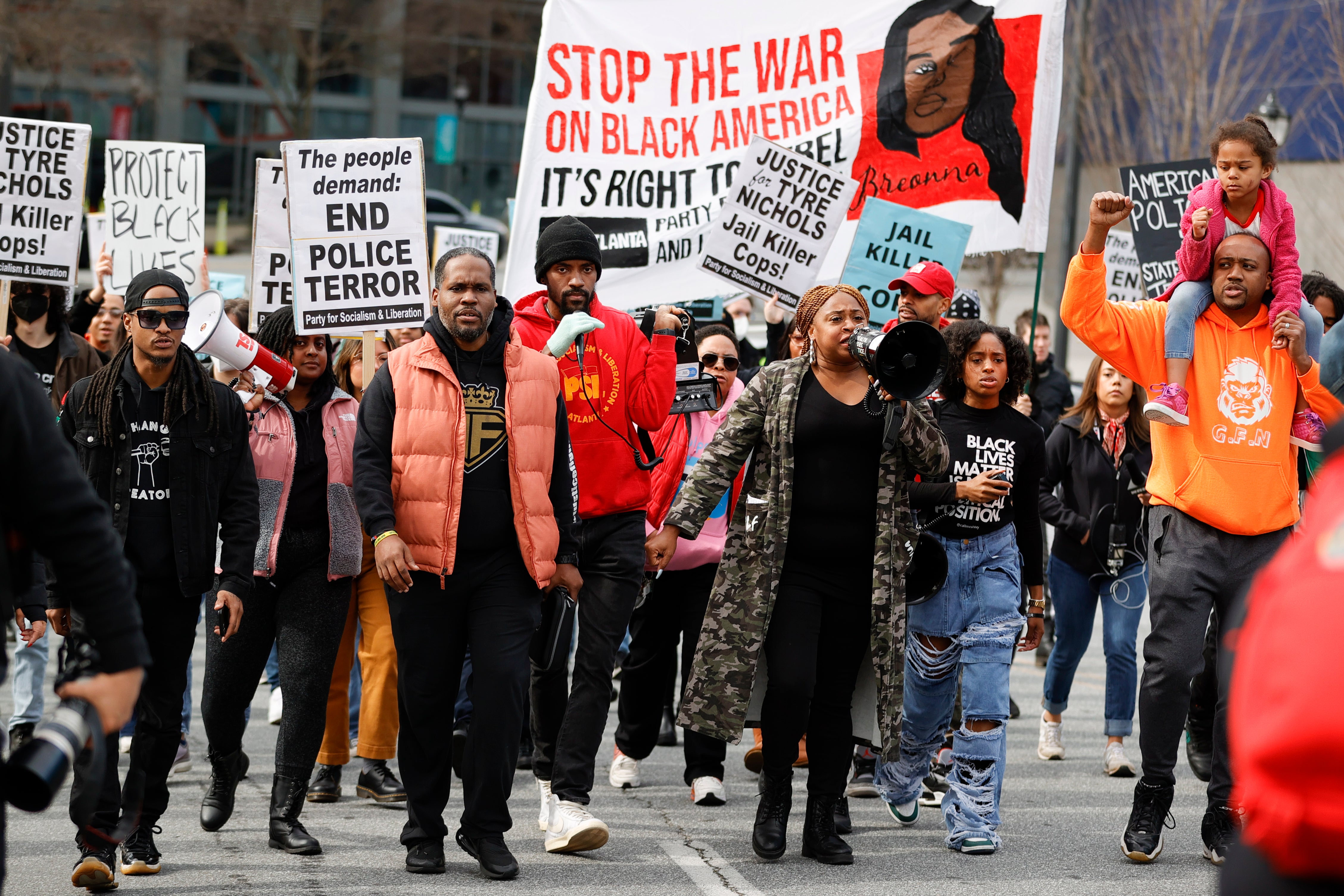 Demonstrators march during a protest on Saturday in Atlanta over the death of Tyre Nichols