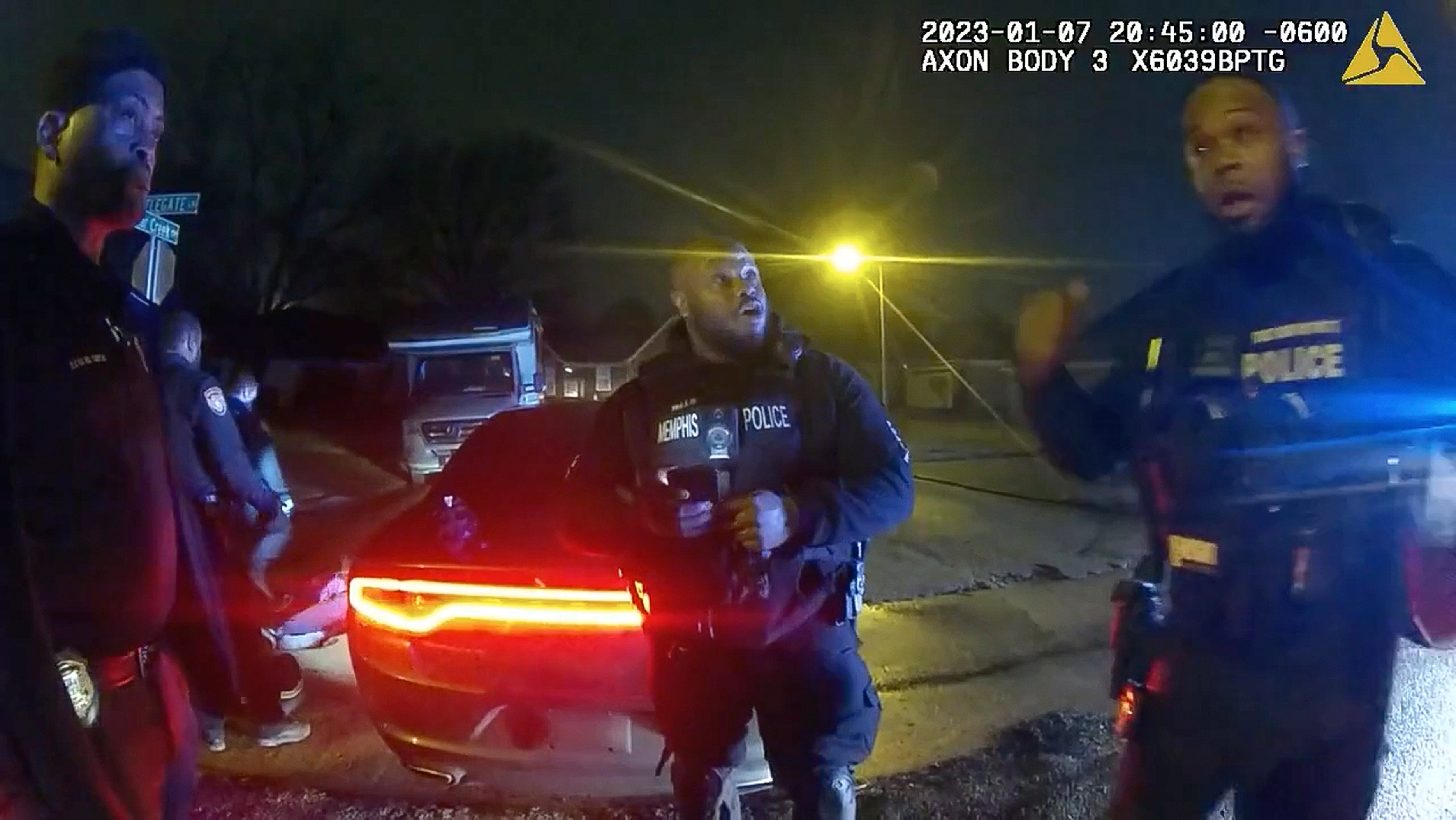 Officers from Memphis’ Scorpion unit stand around discussing the brutal beating of Tyre Nichols.