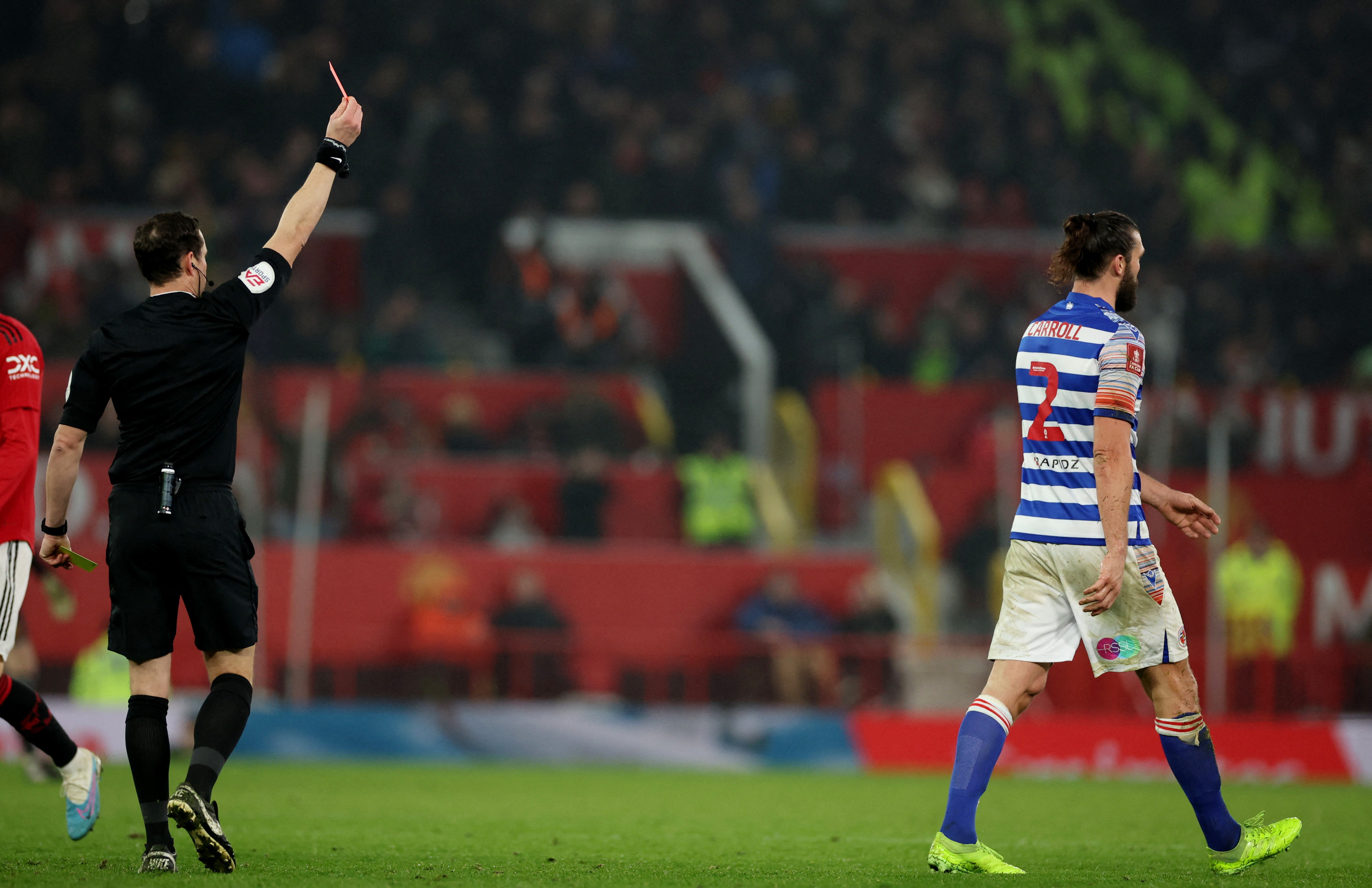 Reading’s Andy Carroll looks dejected after being shown a red card