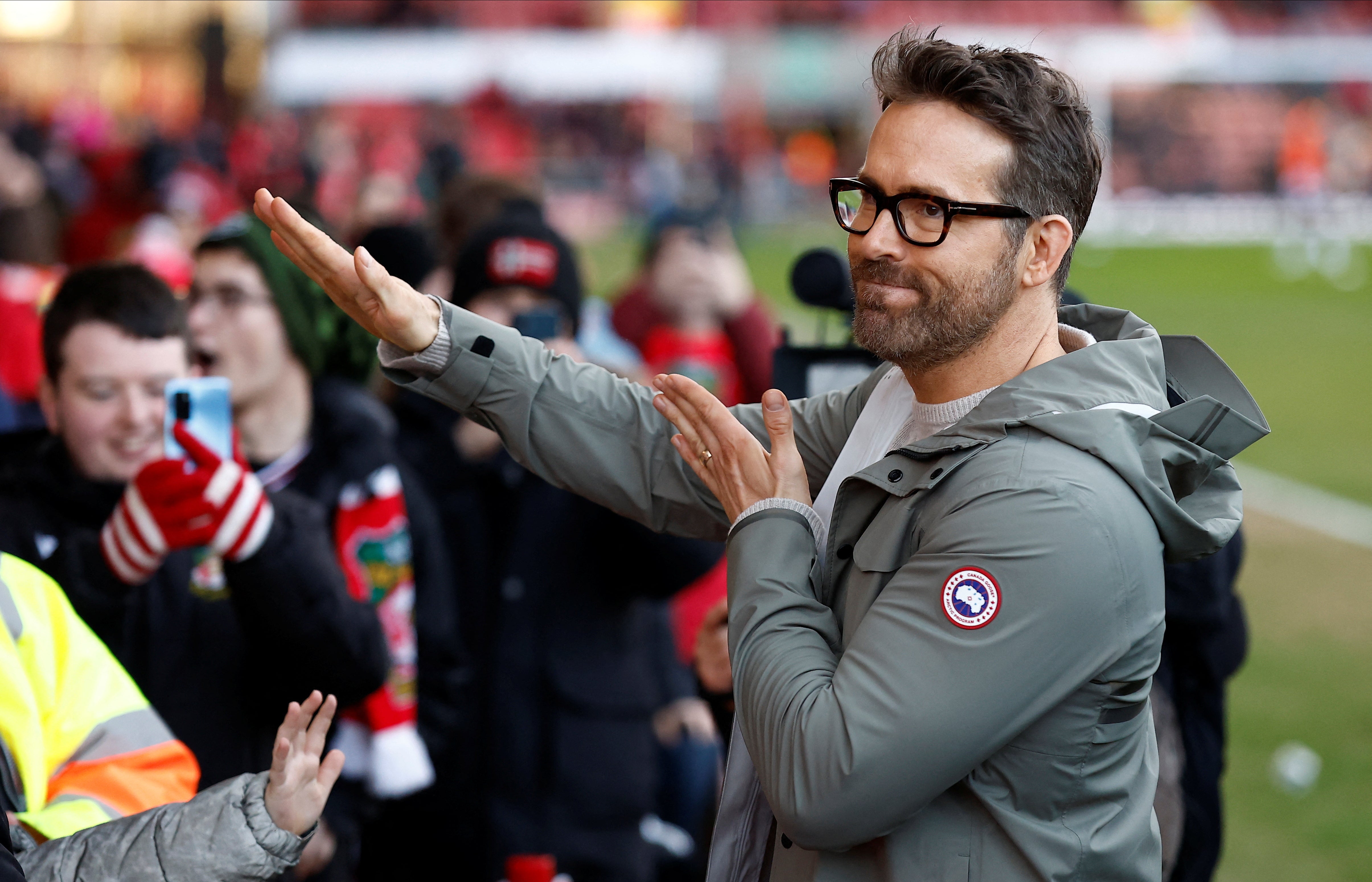 Reynolds meets with fans before a match earlier this season