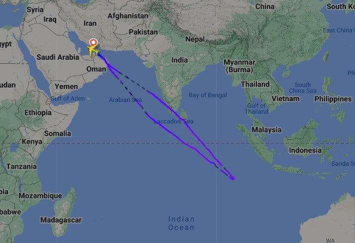 The plane was in the air for 13.5 hours before touching down in its departure city