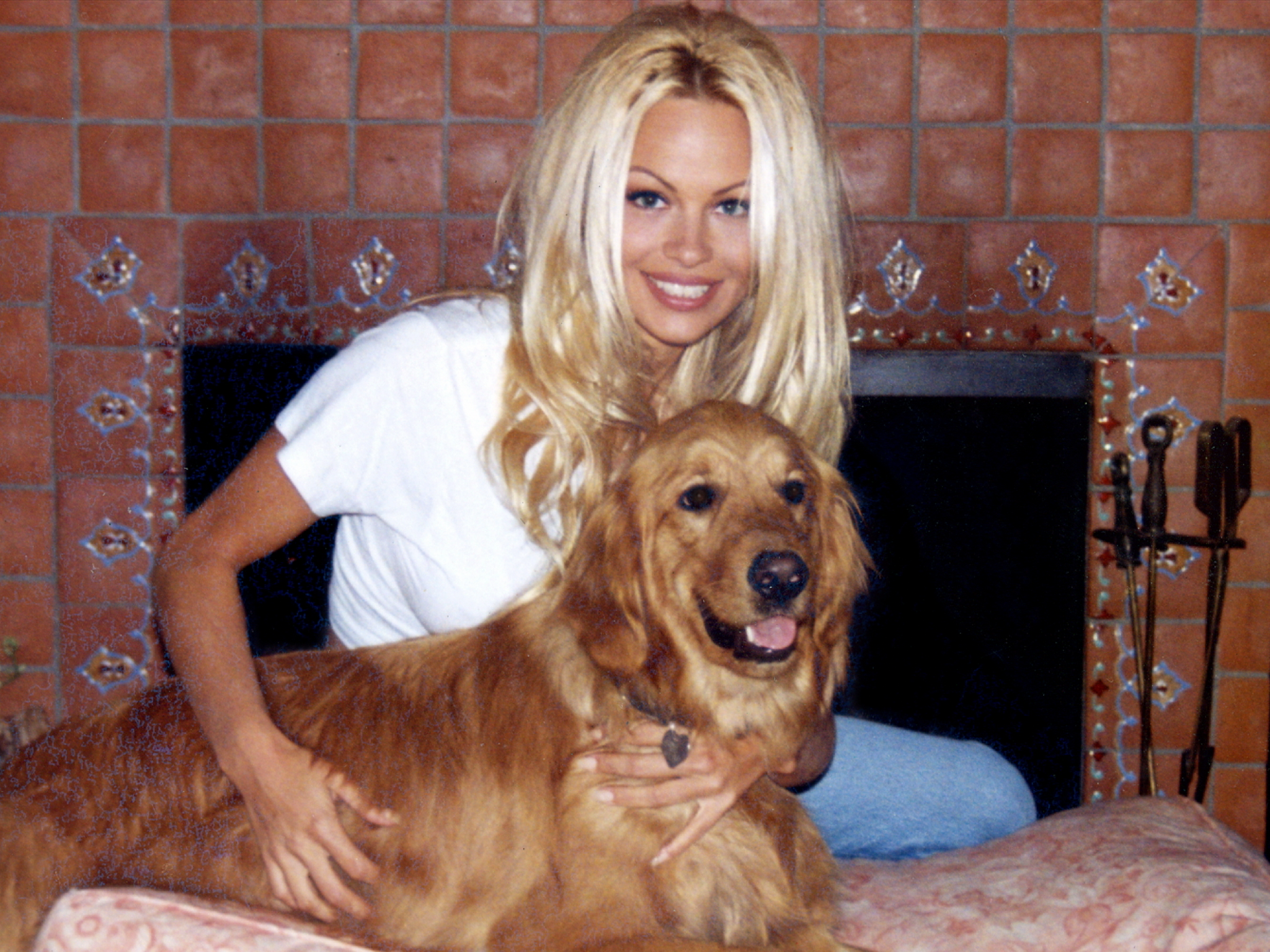 Pamela Anderson with her Golden Retriever, Star