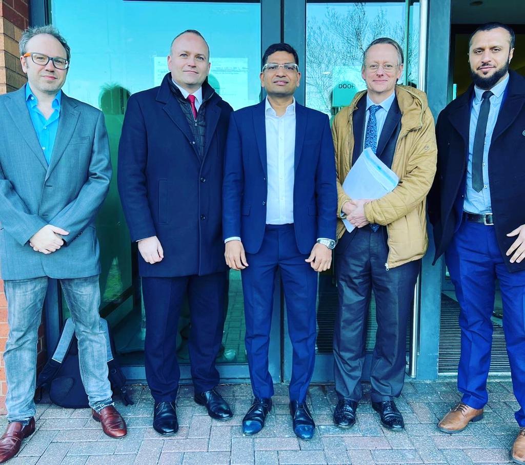 Mr Pandya (C) and his witnesses pictured outside Hatton Cross tribunal hearing centre