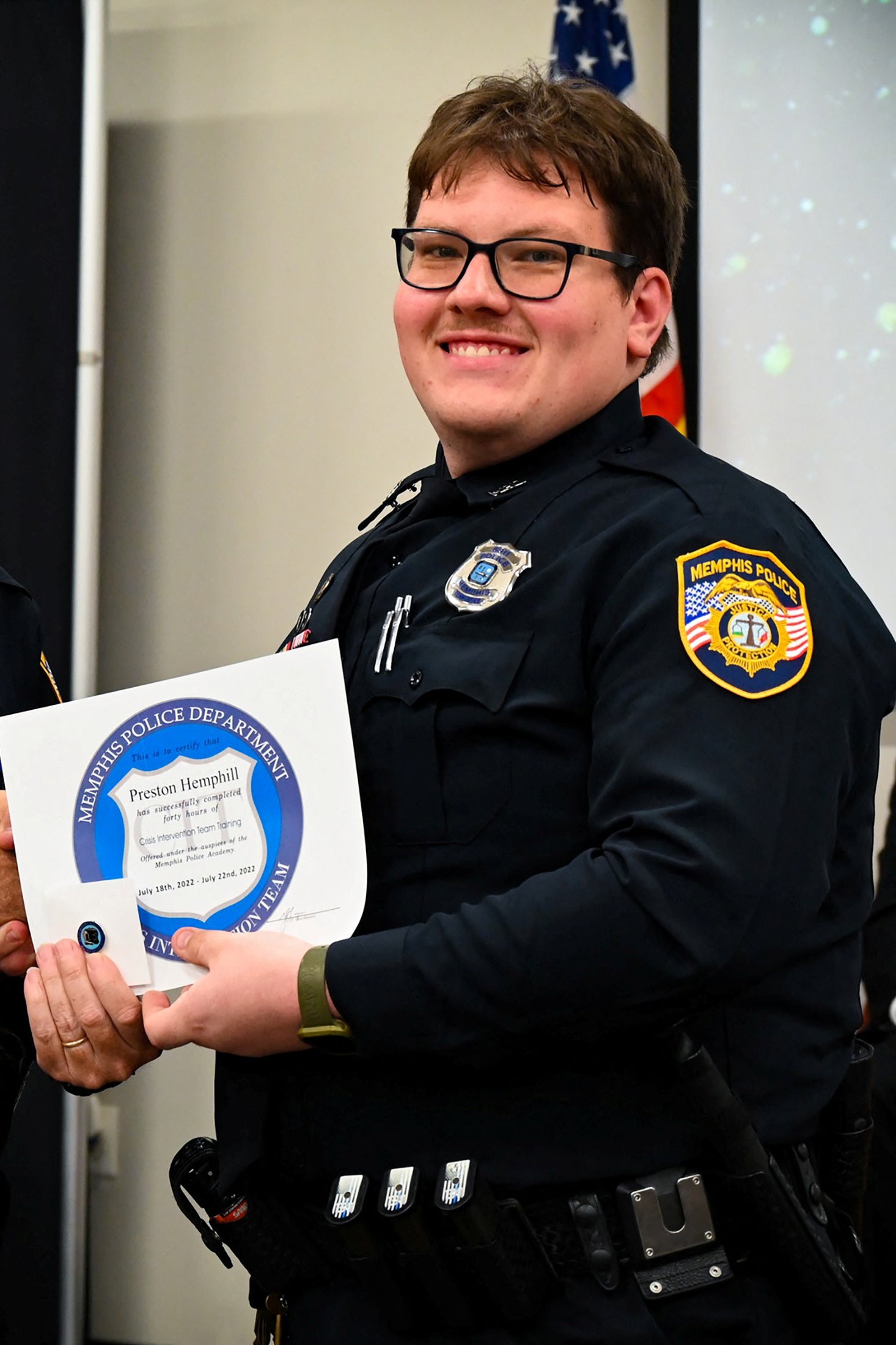 File Memphis Police Department officer Preston Hemphill poses at a graduation ceremony for the 97th Crisis Intervention Class in Memphis, Tennessee